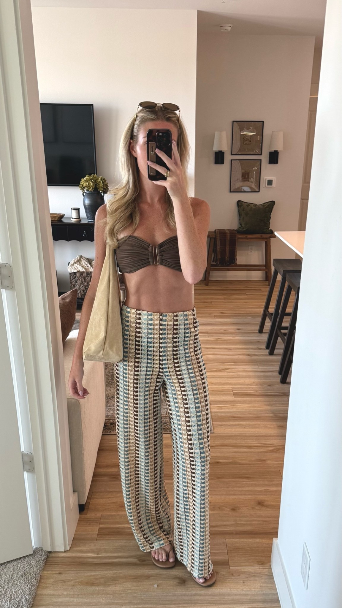 Fun vacation look with statement H&M pants, an Amazon swimsuit, and neutral accessories.

vacation outfit / H&M pants / Amazon swimsuit / beach outfit / resort wear / summer outfit / printed pants / Amazon finds / vacation style

#LTKSeasonal #LTKSwim #LTKTravel