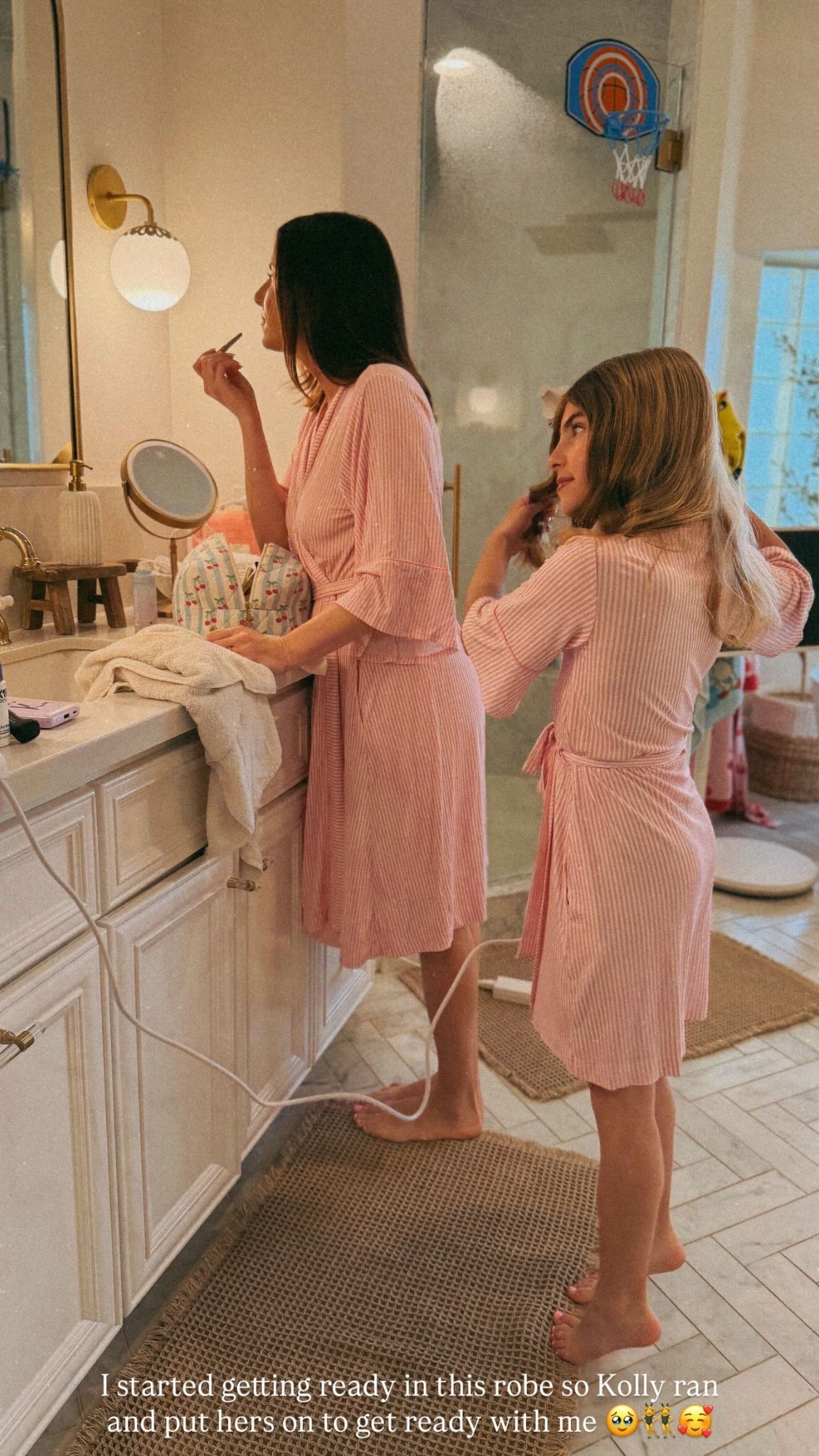 I started getting ready in this robe so Kolly ran and put hers on to get ready with me 🥹👯‍♀️🥰