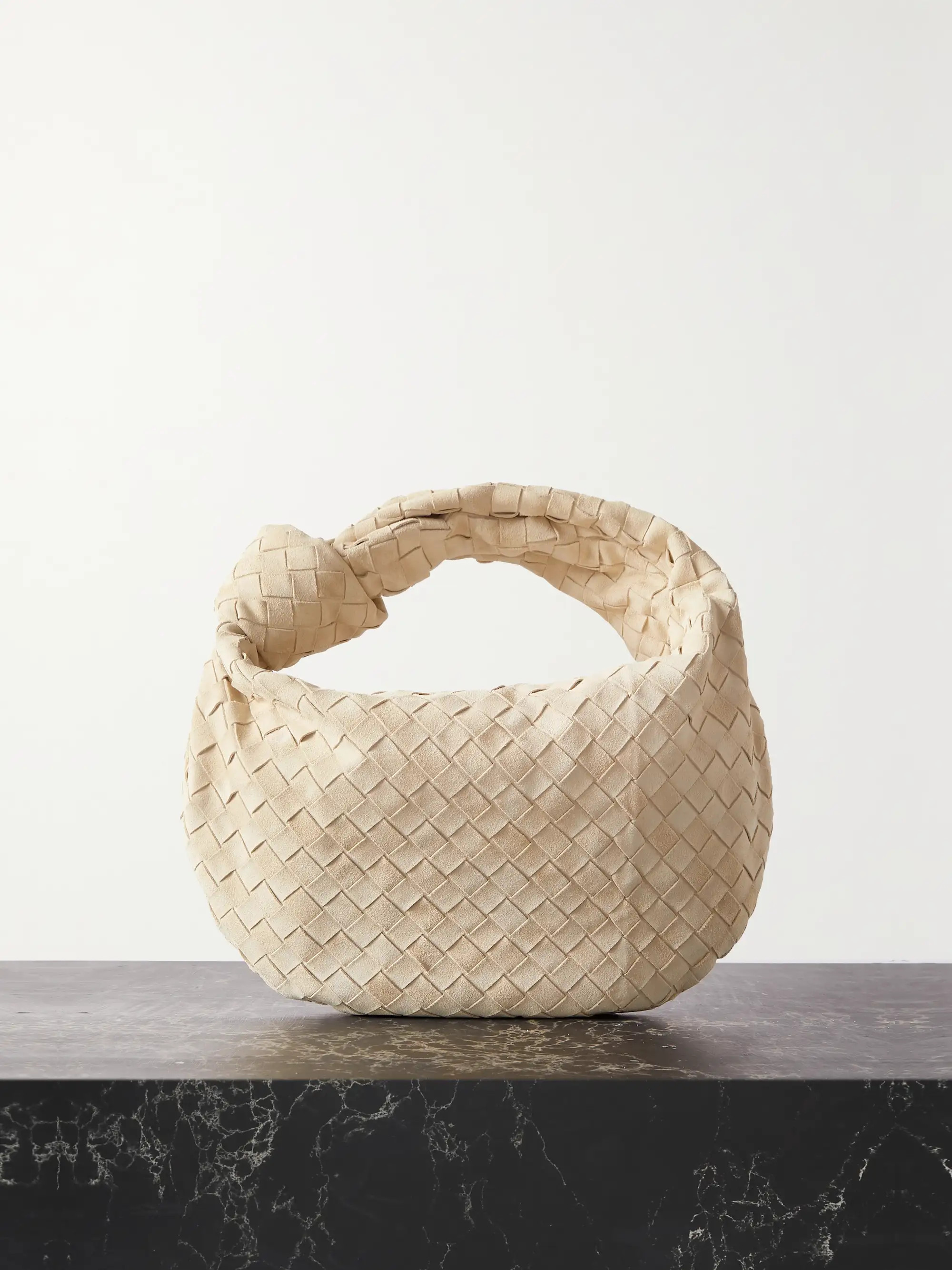 Bottega Veneta's signature intrecciato weave has a home in the wardrobes of the world's best-dres... | NET-A-PORTER (US)