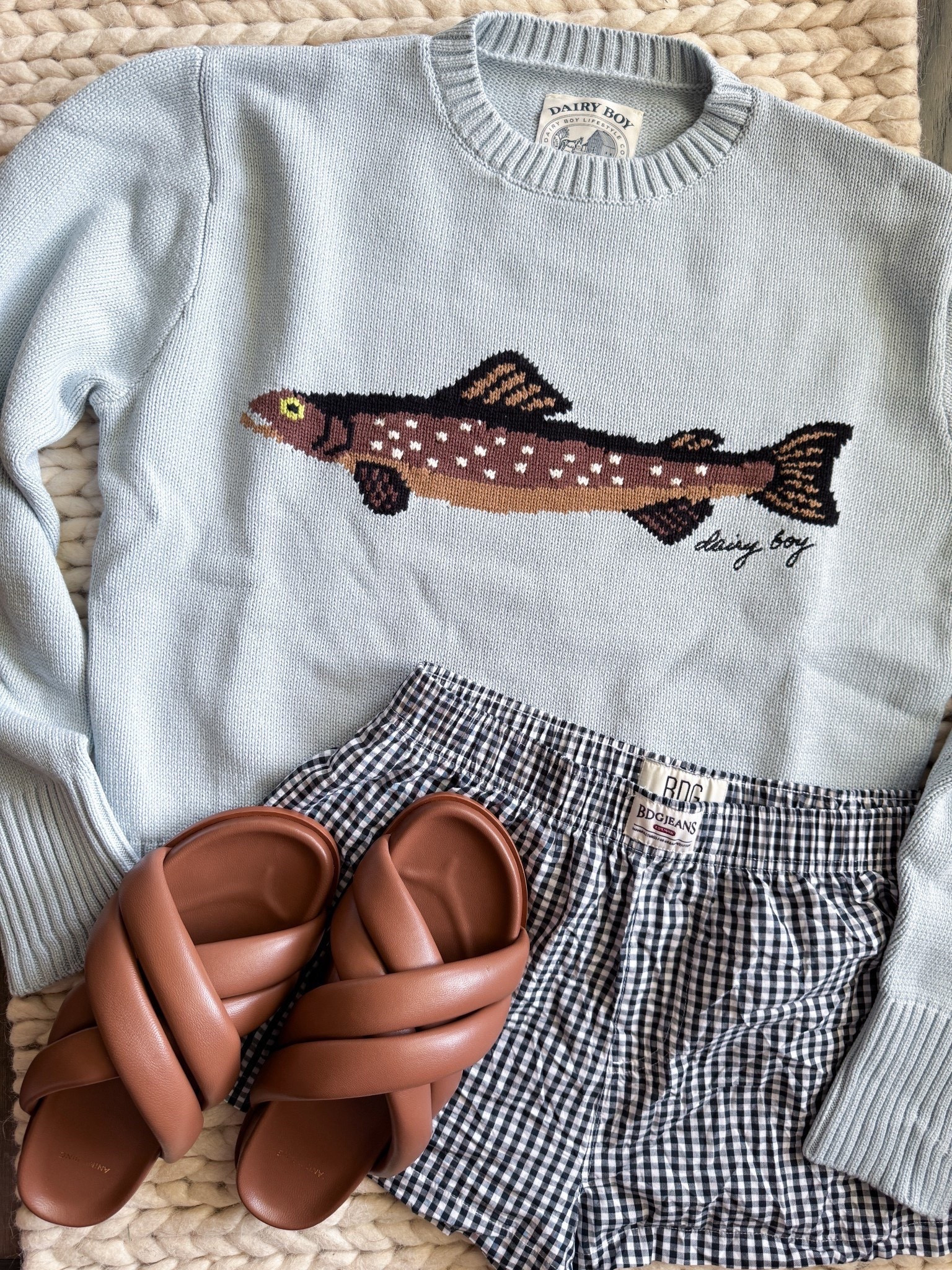 This viral fish sweater is finally back. Restocked in all sizes & both colors from Dairy Boy & yes, still just as perfect layered or styled solo. Gave it a preppy little twist with boxers & slides, but honestly, this one makes a statement no matter how you wear it.

dairy boy fish sweater - viral fall sweater - preppy fall outfit - fishing graphic sweater - novelty knitwear women - oversized cozy sweater - quirky fall fashion - trendy fall capsule - statement knit sweater - seasonal layering piece - comfortable stylish outfit - two color options - restocked fall favorite - giftable fall fashion - dairy boy - fish sweater 

#LTKStyleTip #LTKU #LTKActive