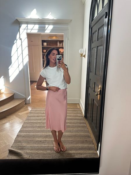 Whether you dress it up or down, this $12 white tee is a summer staple! Wearing a large. And the silk skirt comes in a two pack (only $14 for both!!!). Everything is from Walmart, including my sandals! 

@walmartfashion #walmartfashion #walmartpartner

#LTKStyleTip #LTKFindsUnder50 #LTKSeasonal