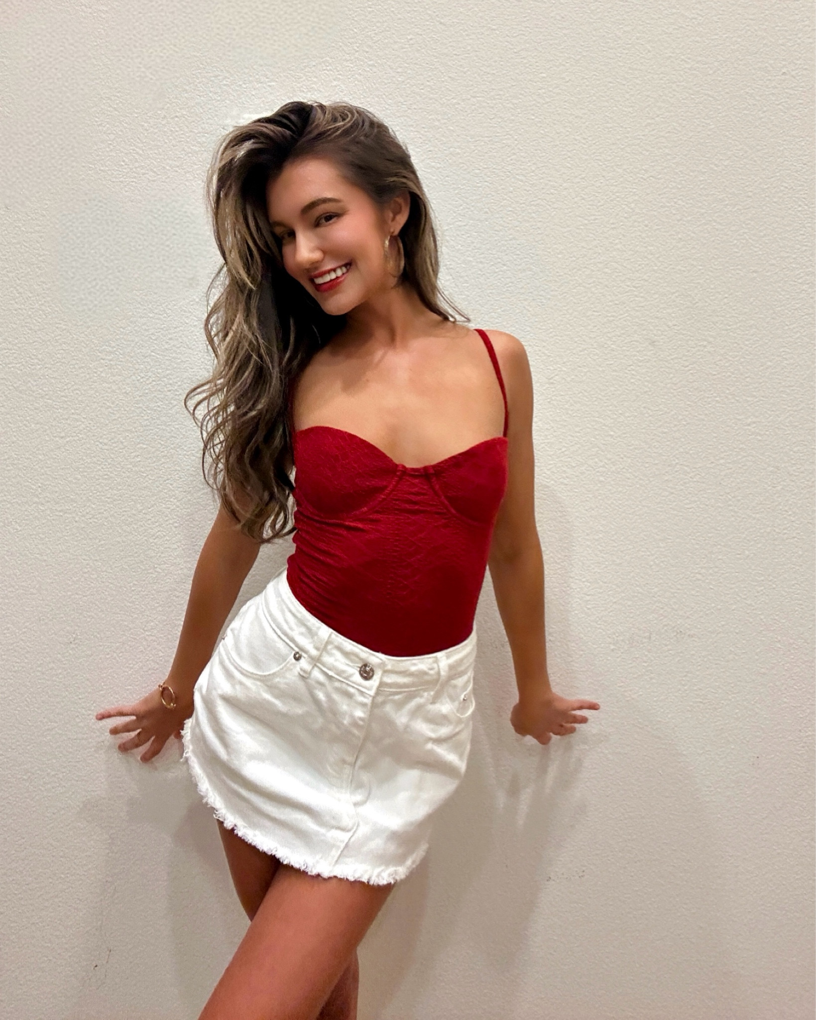 red bodysuit, country concert outfit, summer outfit, white denim skirt, mini skirt, curling iron, wavy hair, curls, makeup, red lipstick  

#LTKBeauty #LTKStyleTip #LTKU
