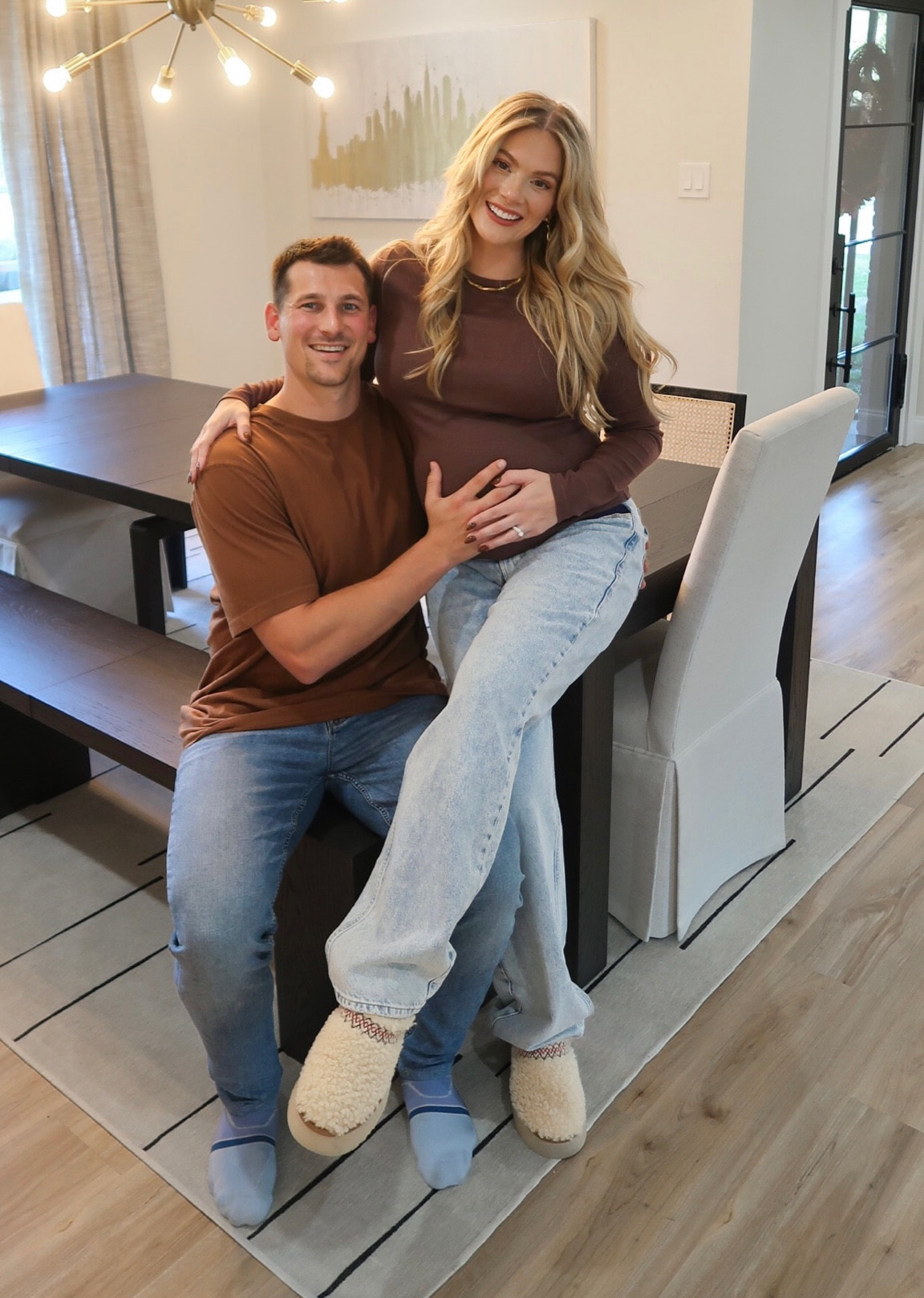 Link fuzzy ugg Tazz in stock at both dillards and Victoria’s Secret (size up 1. I’m a 7 but wearing the 8) along with maternity jeans and ultra soft long sleeve ribbed top (medium) 

#LTKshoecrush #LTKGiftGuide #LTKbump