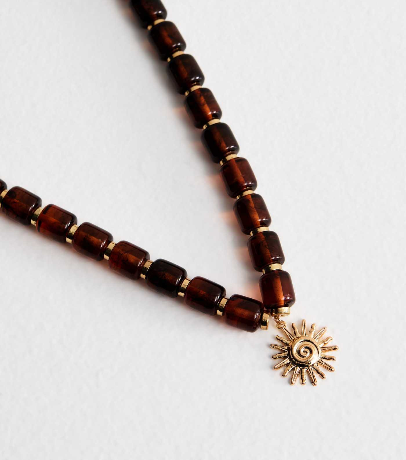 Brown Tortoiseshell Beaded Sun Pendant Necklace | New Look | New Look (UK)