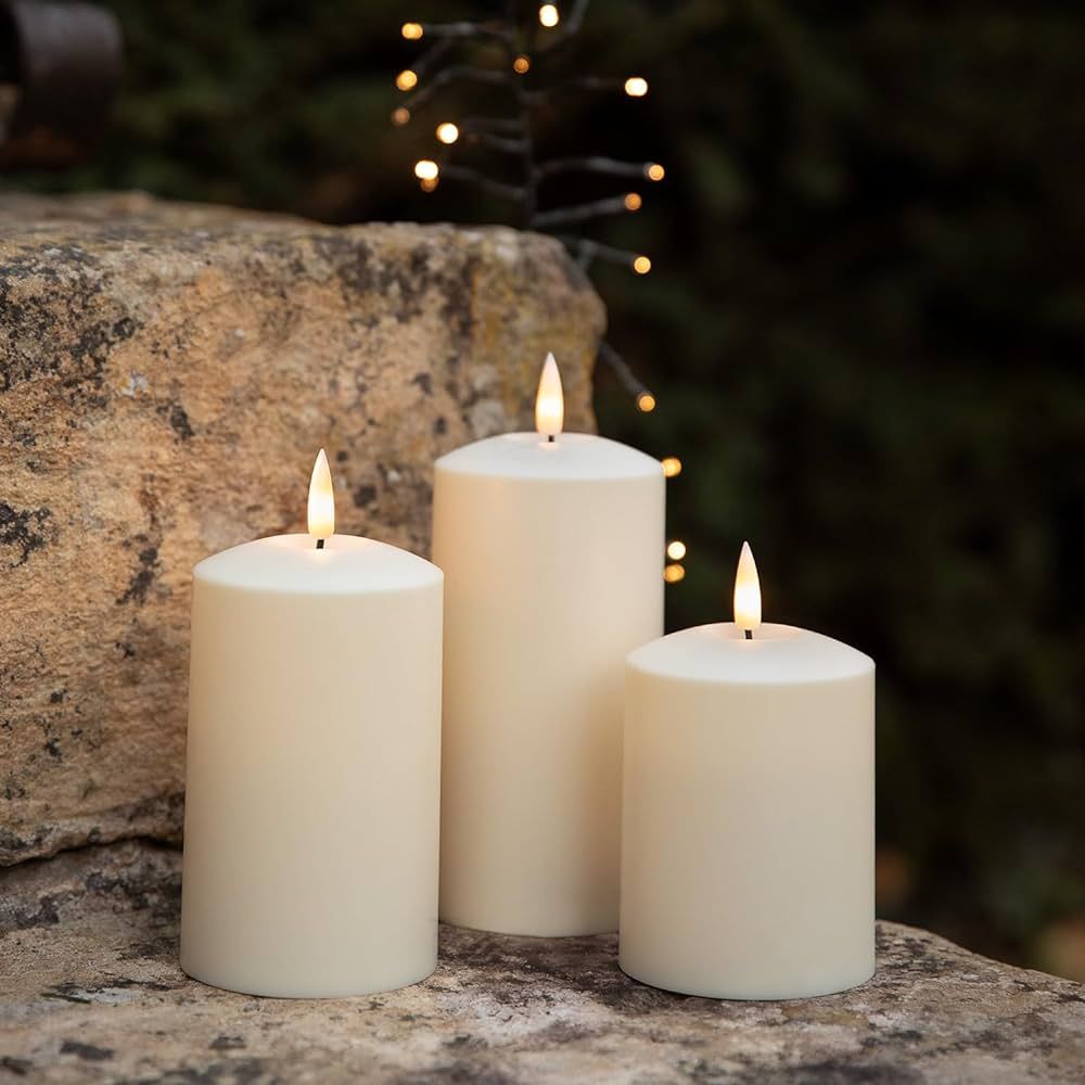 Amazon.com: lights4fun Set of 3 TruGlow Solar Powered Ivory Flameless LED Pillar Candles for Outd... | Amazon (US)