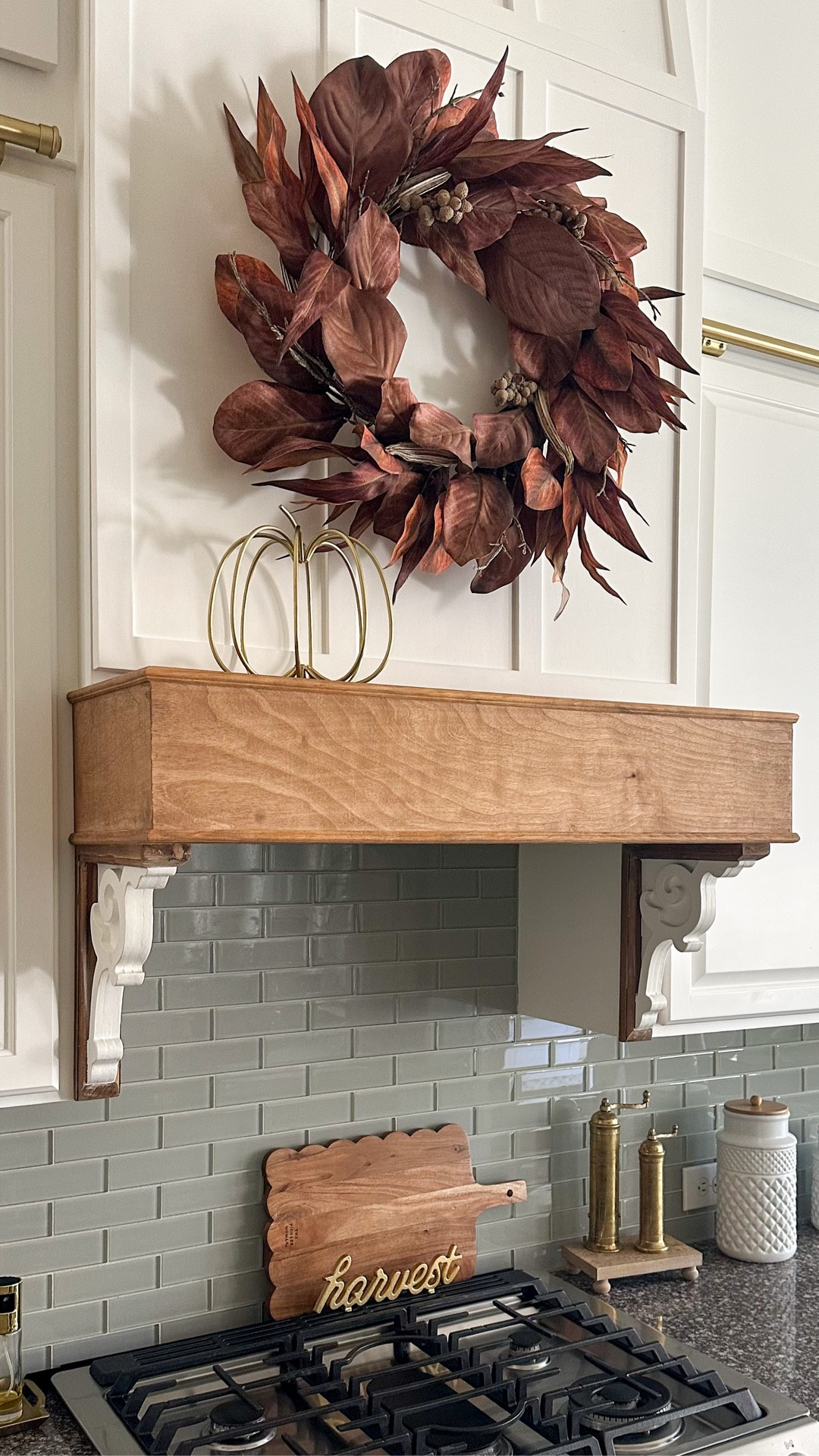 This scalloped serving board IS BACK IN STOCK!  It’s the perfect finish to my Fall kitchen decor and I’m loving all the gold and rich Fall colors in my kitchen!

#LTKHome #LTKSeasonal