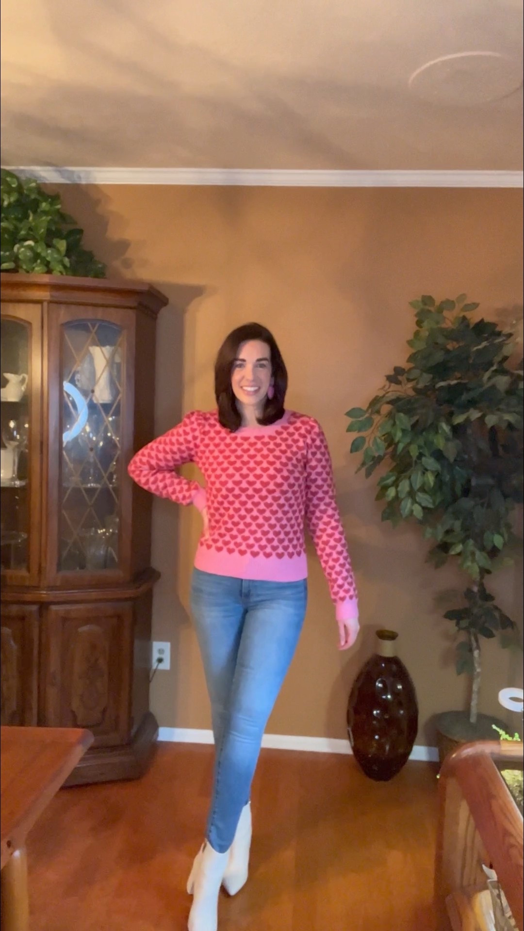 Pink and red heart sweater (xs). Mid rise skinny jeans (4). White boots (8.5). #sweater #heartsweater #pinksweater #jeans #skinnyjeans #midrisejeans #valentinesdayoutfit #datenightoutfit 
date night outfits 
valentines outfit women

#LTKValentine #LTKSeasonal #LTKootd