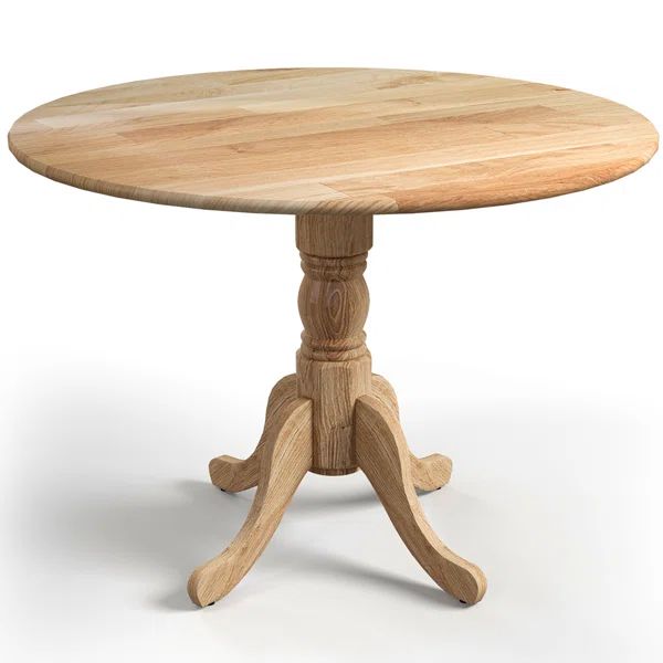 Arush Round Solid Wood Dining Table | Wayfair North America