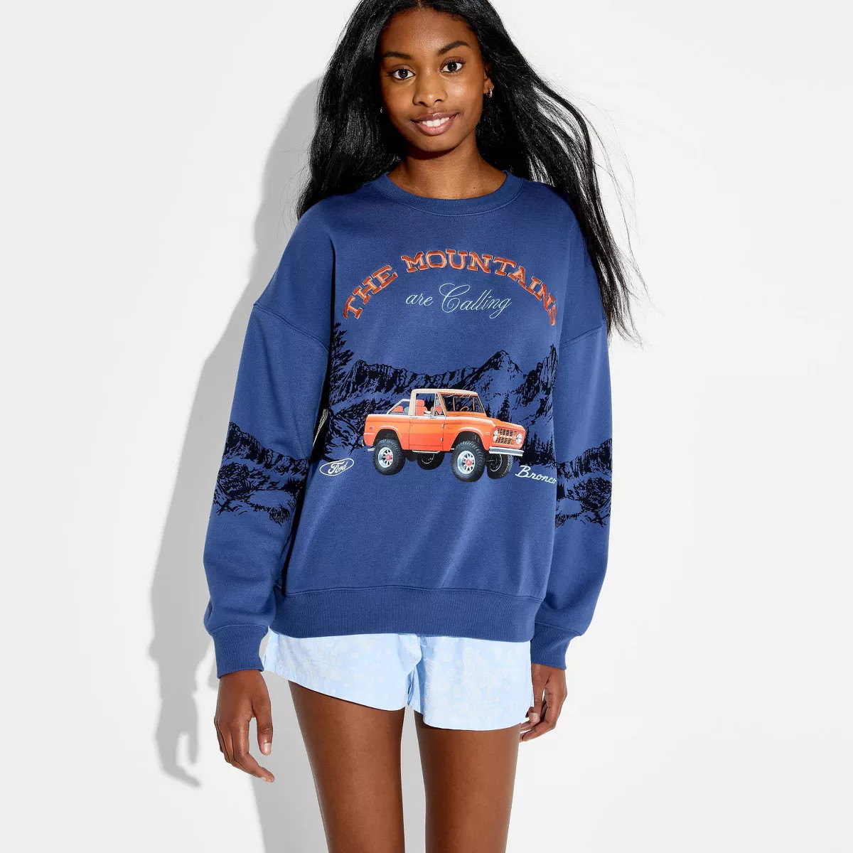 Women's Crewneck Bronco Mountains Graphic Pullover Sweatshirt - Navy Blue M | Target