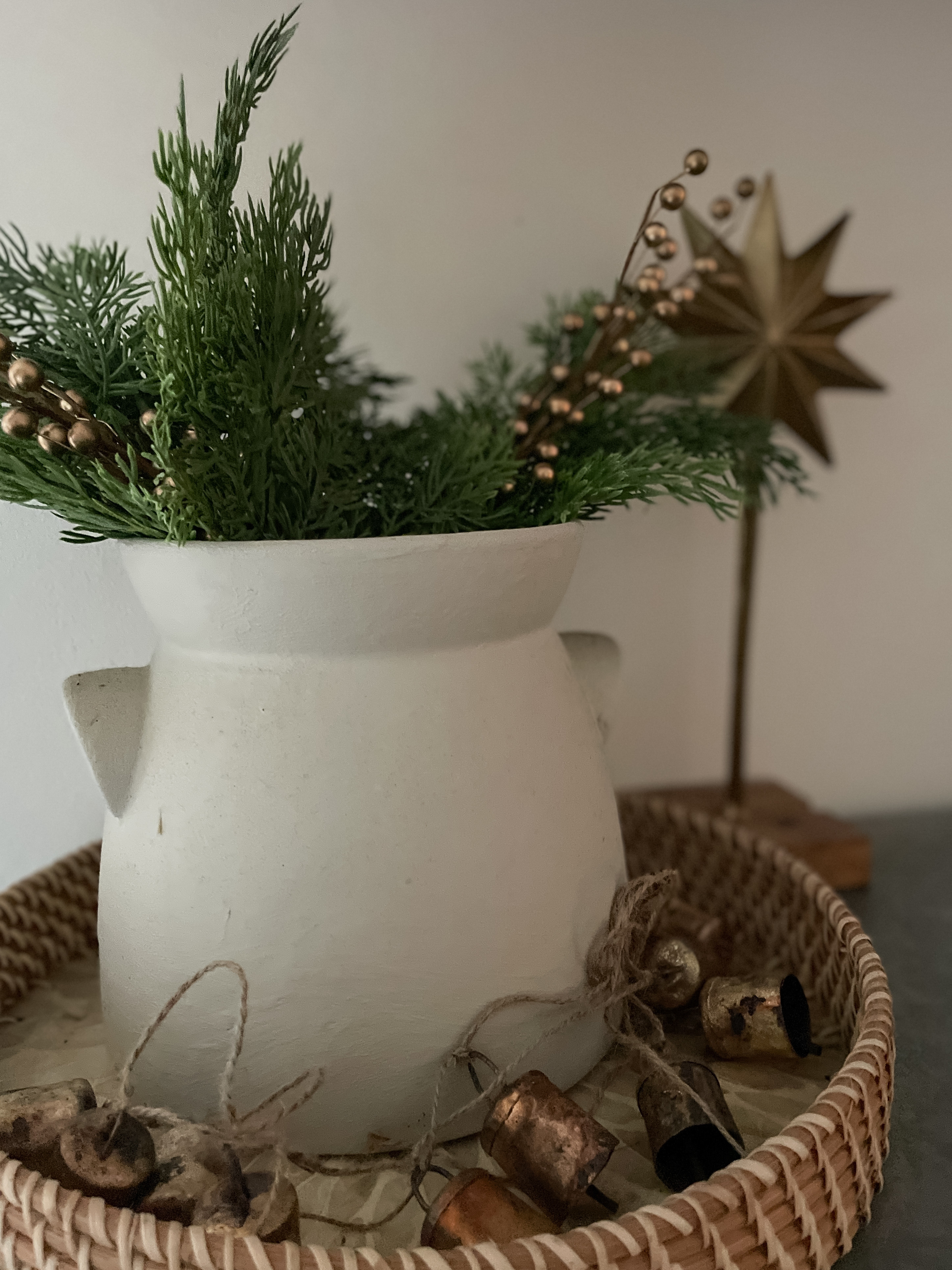 Add in cedar or pine sprigs to a vase and a homemade bell garland.  

Christmas decor.  Pine or cedar sprigs. Bells.  

#LTKFindsUnder50 #LTKHoliday #LTKHome