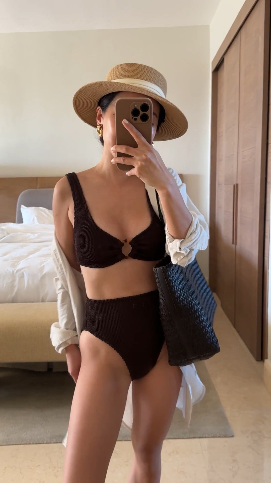 Love this textured high rise bikini! Also in stripes, red or black or a one piece that I also got and really like

• jcrew O-ring scrunchie bikini top in espresso brown xxs

• scrunchie bikini bottom in espresso xxs 

• sam Edelman sandals 5 - I get these wet all the time from the pool or splash pads and they’ve held up great!

• Amazon packable sunhat with an adjustable inner fit. I’ve owned this for years and share with Nori since I can adjust the inner fit using the Velcro strap to be smaller! 

• Madewell woven leather tote 

• jcrew linen shirt xxs runs big and loose but i love the loose coverage from the sun 

#LTKPetite #LTKTravel #LTKSwim