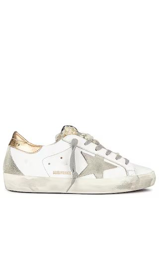 X REVOLVE Superstar Shearling Sneaker in White, Gold & Ice | Revolve Clothing (Global)