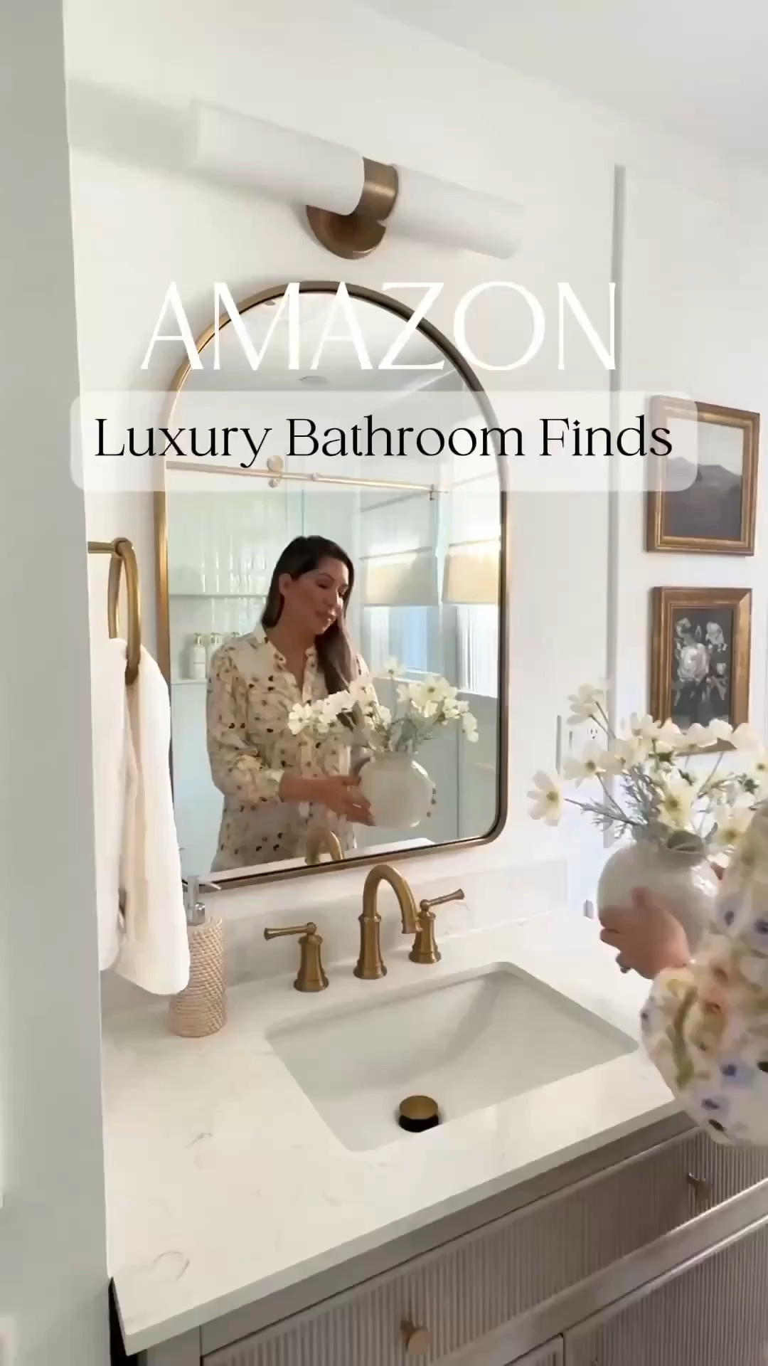 Our bathroom is one of those spaces that instantly makes me feel relaxed every time I walk in. 🤎✨

I love mixing affordable Amazon finds with timeless design because you really don’t have to spend a fortune to create a space that feels elevated. Warm wood tones, beautiful lighting, classic mirrors, and a few thoughtfully chosen accessories can completely change the feel of a room.

It’s proof that designer-inspired style is all about the details. Layering textures and choosing pieces you truly love can turn an everyday bathroom into a space that feels cozy, inviting, and a little bit luxurious. 🌿

#LTKHome #LTKvlog #LTKmomlife