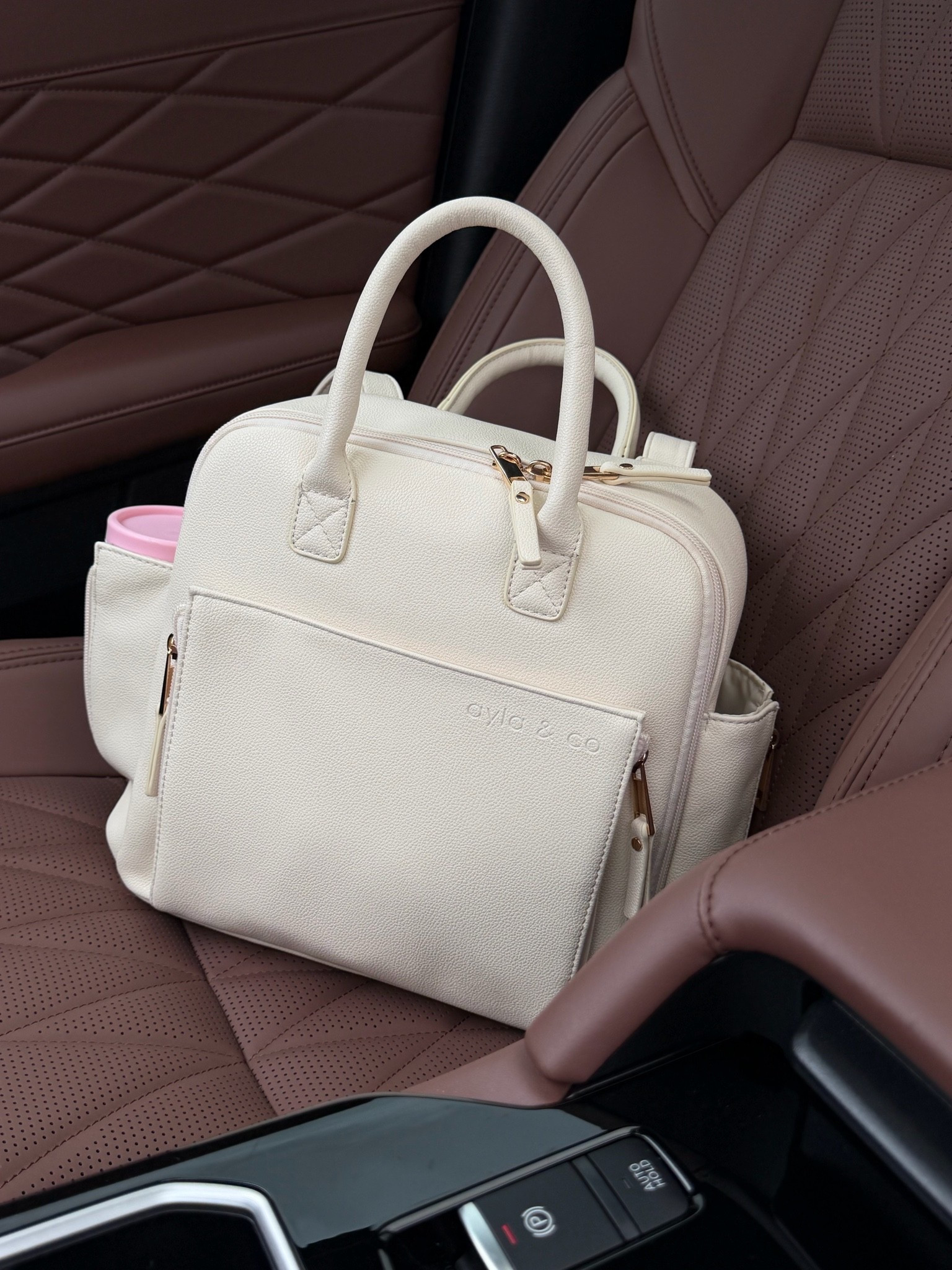 Favorite mini diaper bag👜🤎🧸