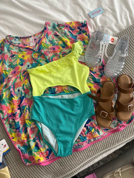 Love these bright color for Liv! Perfect for summer time! These sandals are super comfortable for perfect for wider feet.. and who does love a jelly sandal? Great finds from Target!

#LTKswim #LTKkids #LTKstyletip