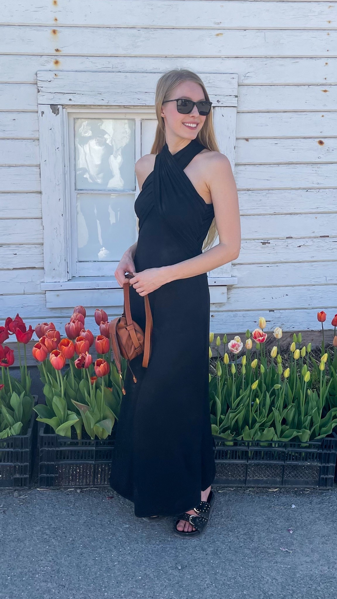 Alyssa dress, convertible and an transform form a halter to on the shoulder. Wearing xs. 