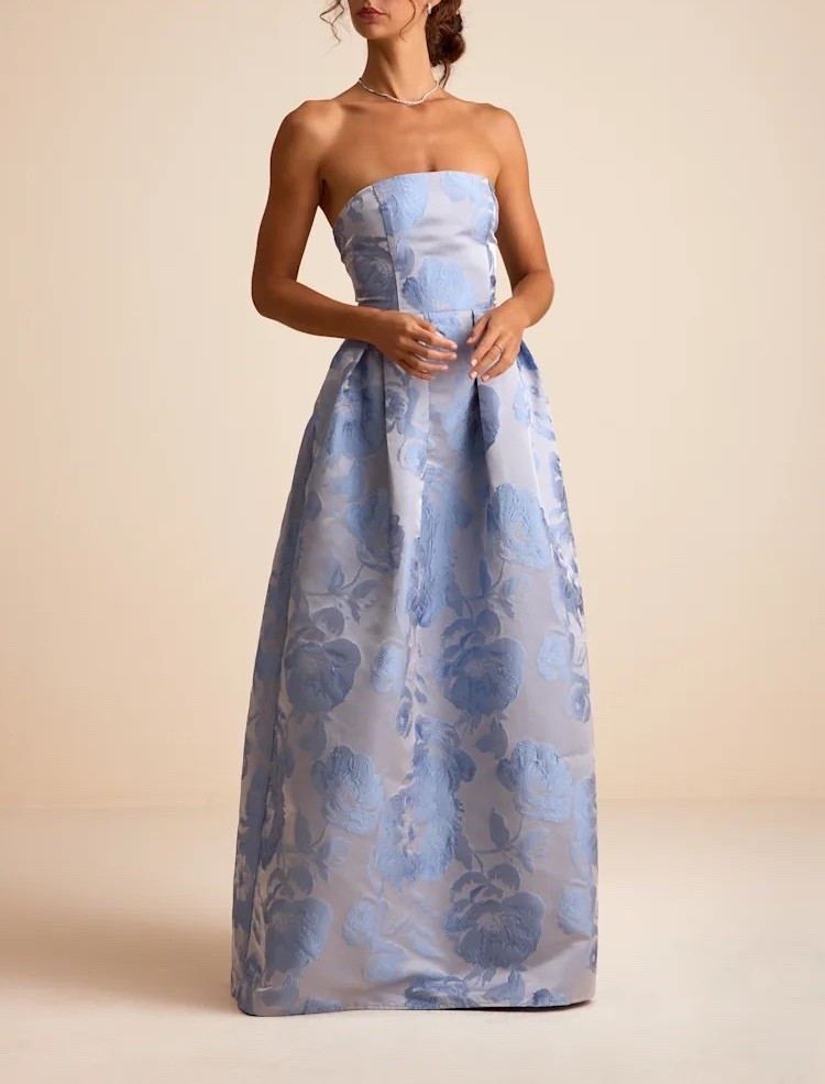 The Laurelin Slate Blue Floral Jacquard Pleated Strapless Maxi Dress brings romantic sophistication to occasion dressing with its delicate floral jacquard, graceful pleating, and elegant strapless silhouette. The soft slate blue hue makes it a beautiful choice for weddings, garden parties, destination celebrations, and polished summer evenings. Under $120.

Ideas:

* slate blue elegance
* floral jacquard
* pleated maxi dress
* strapless sophistication
* romantic occasion wear

Keywords:

* slate blue dress
* blue maxi dress
* floral maxi dress
* blue floral dress
* jacquard maxi dress
* floral jacquard dress
* pleated maxi dress
* strapless maxi dress
* wedding guest dress
* summer wedding guest dress
* garden party dress
* destination wedding dress
* bridal shower dress
* special occasion dress
* elegant summer dress

#LTKgrwm #LTKootd #LTKWedding