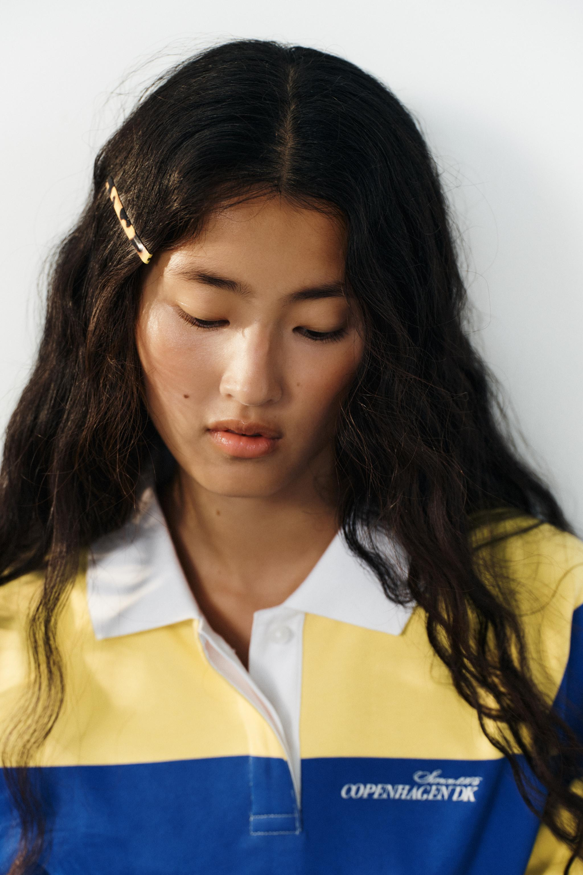 Model height: 173 cmPolo shirt made from 100% cotton. Featuring a contrast regular collar with bu... | Zara DE