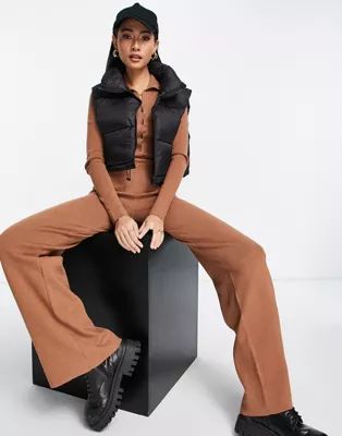 ASOS DESIGN knit flare jumpsuit with button front in brown | ASOS (Global)