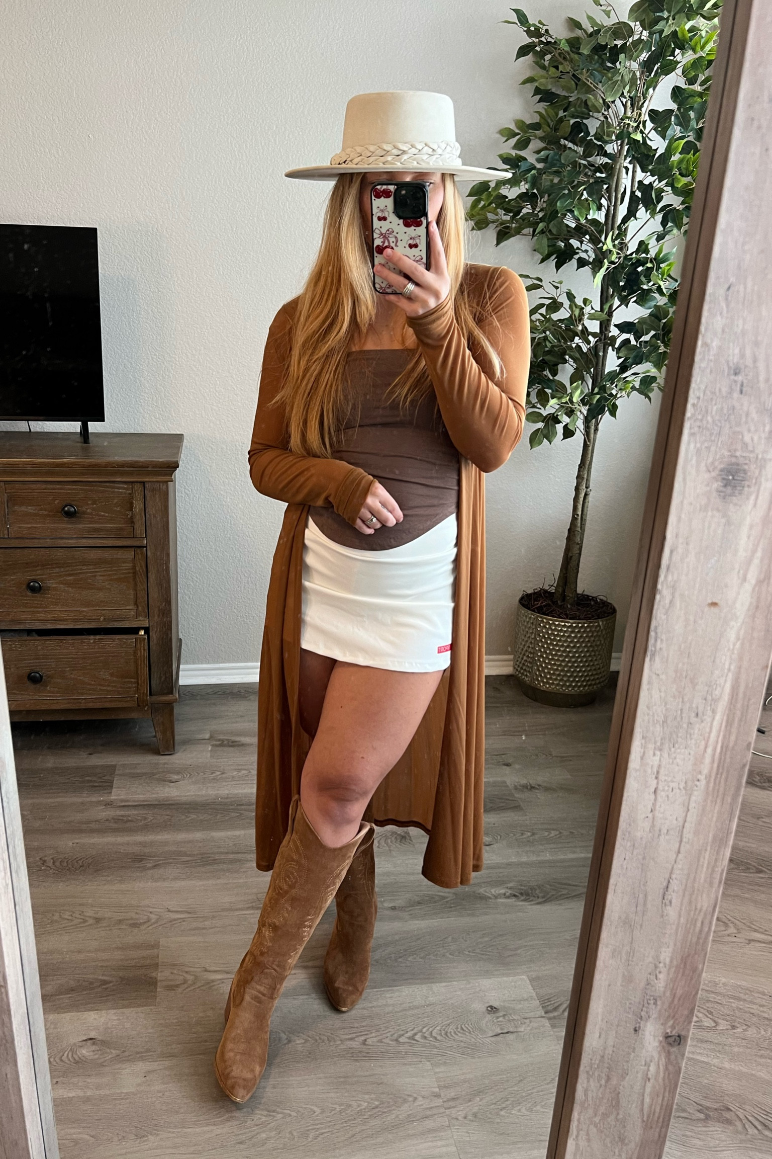 Outfit ideas - boho - outfit - western - skirt - tube top - mesh - long cardigan - boots - cowboy boots- western hat - flat brim hat - boho hat - date night outfit- early fall - fall outfit - thanksgiving outfit - holiday outfit 

#LTKSeasonal #LTKStyleTip #LTKShoeCrush