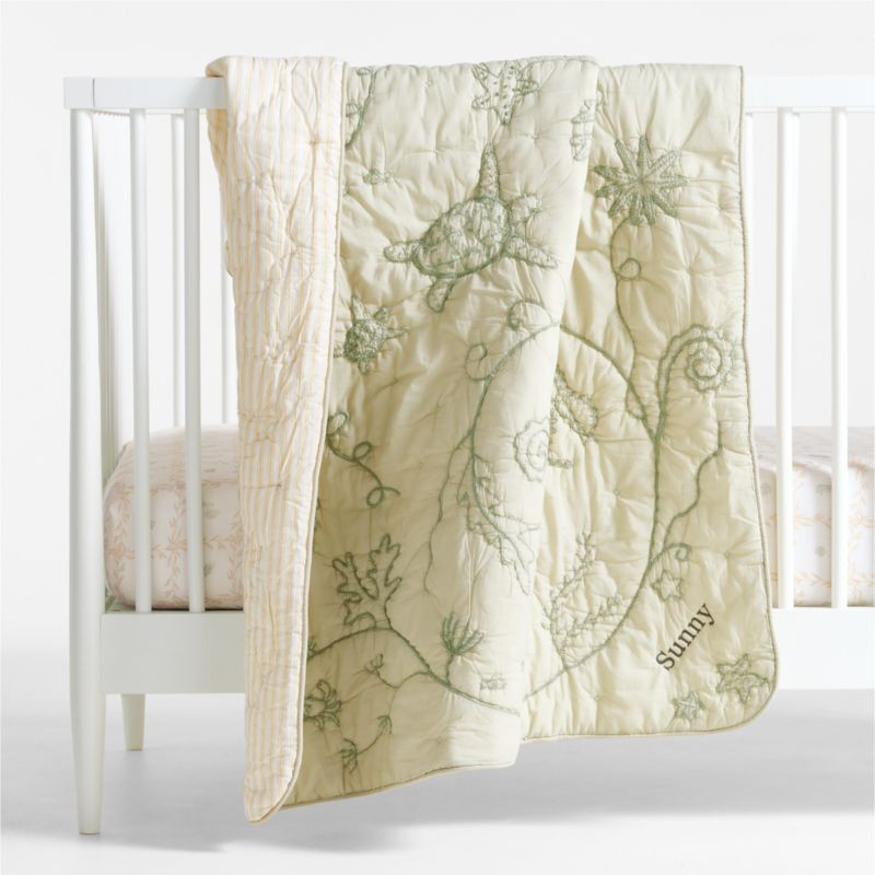 Raphaela Green Seascape 100% Organic Cotton Baby Crib Quilt by Jake Arnold | Crate & Barrel