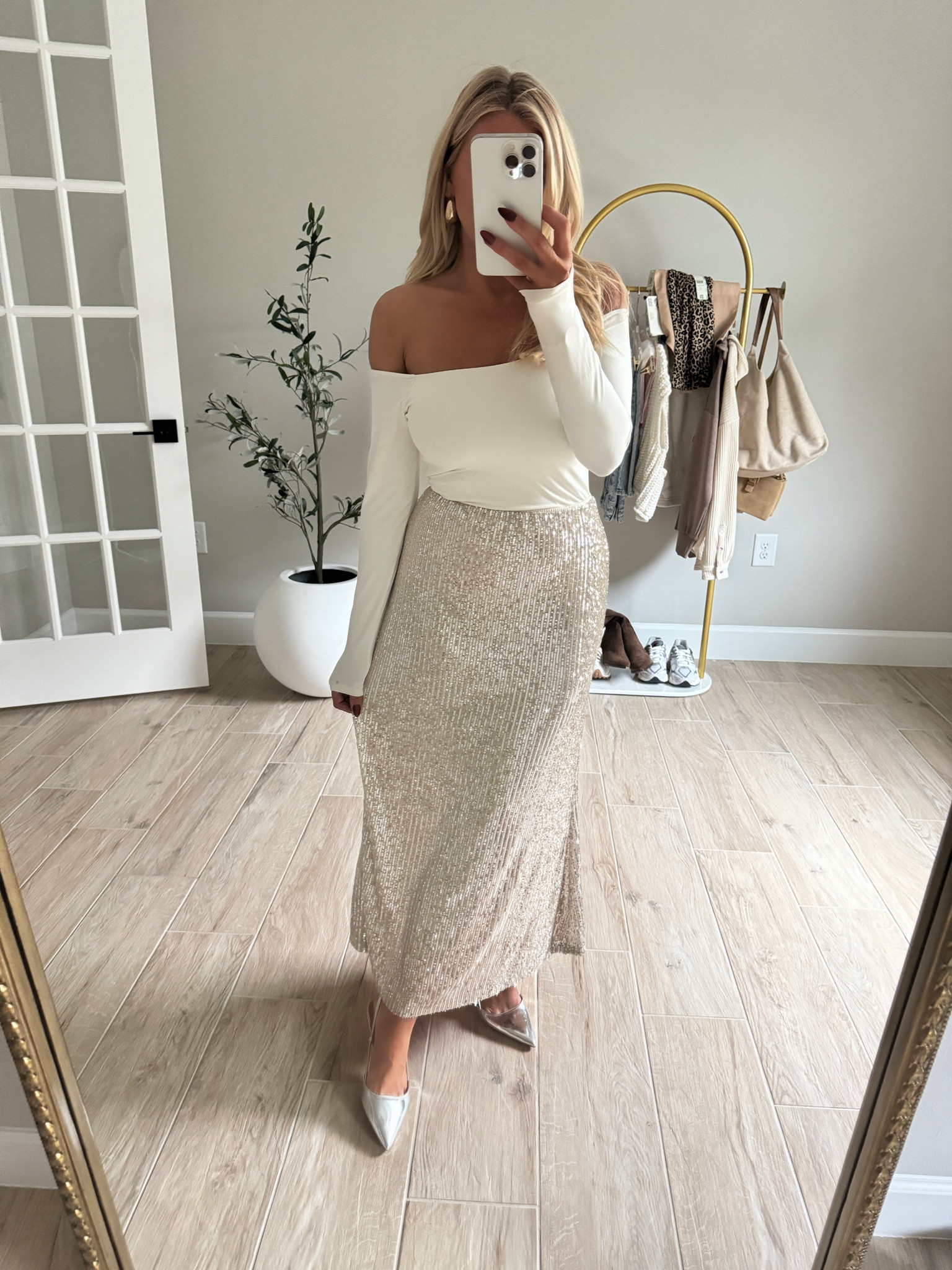 Love this holiday outfit look from old navy! The skirt quality is so good! I did a size small it’s stretchy, the top is amazing if you love the look of bodysuits but don’t want a bodysuit! This one is nice and thick and not see through, I’m not wearing a bra :) size XS 

Christmas outfit Christmas photos holiday looks new years outfit New Year’s Eve outfit 