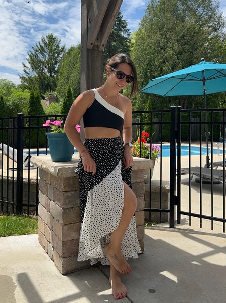 Chic summer beach outfit. One shoulder bikini top and wrap polka dot skirt coverup. Go from the beach to brunch! 

#LTKswim #LTKstyletip #LTKunder100