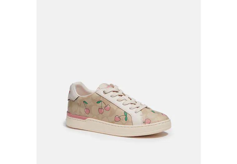 Clip Low Top Sneaker In Signature Canvas With Heart Cherry Print | Coach Outlet