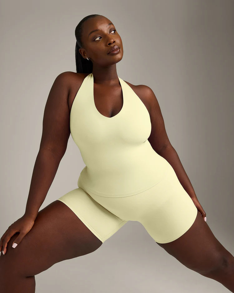 SoftMotion\u2122 Halter Neck Tank Top with Built in Bra Shelf with Gray Logo
Pastel Yellow | Oner Active (UK / US)