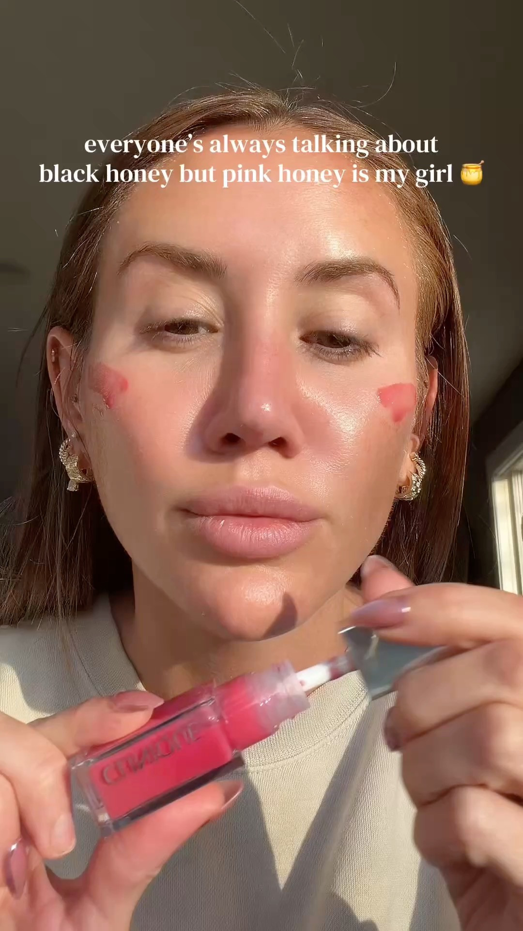 the easiest no makeup makeup product: a 2 in 1 tinted lip and cheek oil in sheer pink honey. swipe it on lips for dewy color, tap on cheeks for a natural pink flush. conditions lips so they look smoother, never dry or sticky.
#lipoil #cheektint #nomakeupmakeup #everydaymakeup #beauty 

 #LTKBeauty