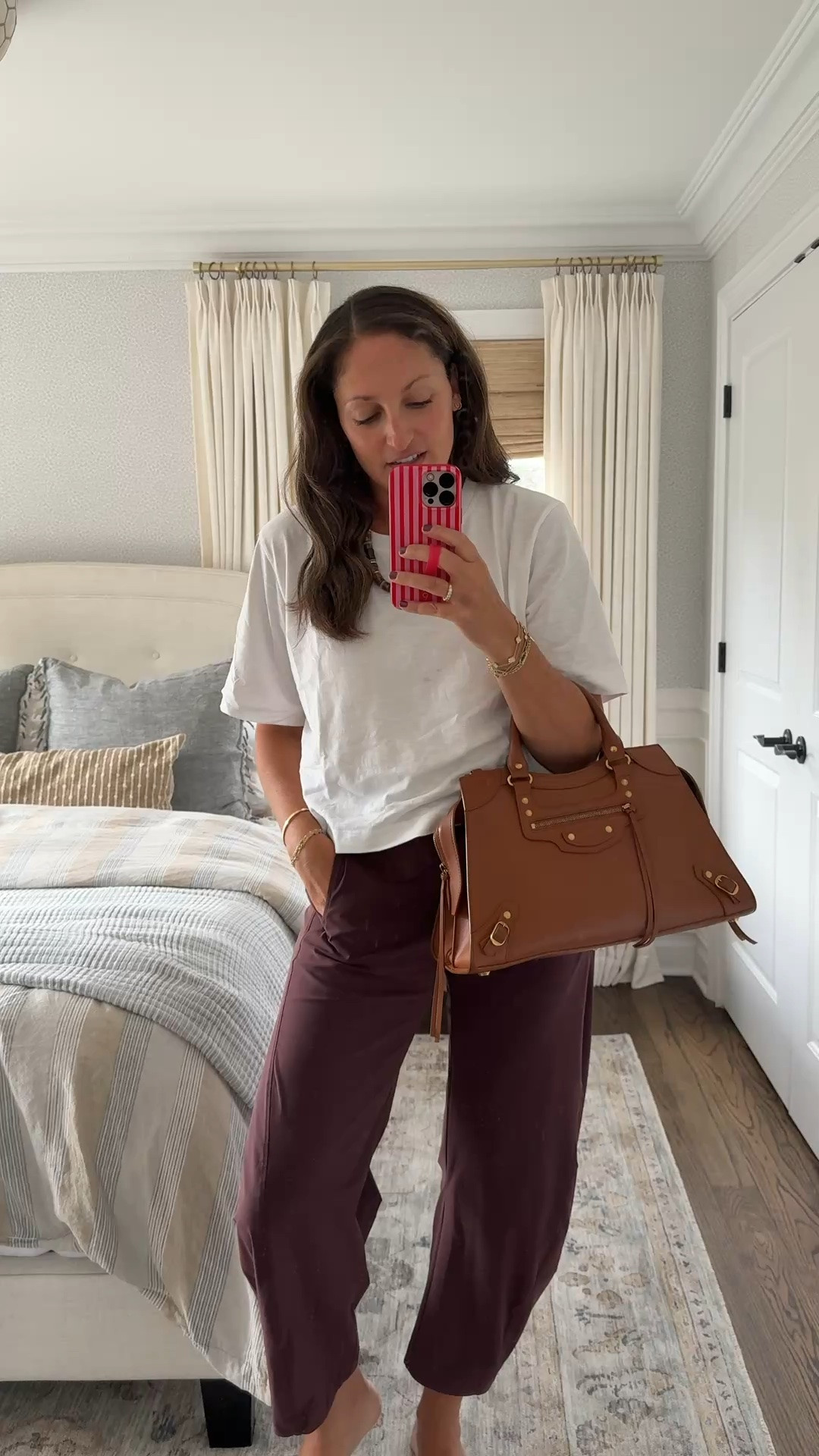 Today’s work OOTD! These @Ruti pants are SO GOOD and the fall colors are insane! I’m obsessed with them in the aubergine. Paired with my favorite boxy tee, chunky beaded necklace and  my newest borrow from @Vivrelle!! 

PS you can use code MICHELLEPULMAN for three months of FREE borrowing from Vuvrelle!!)

#LTKSaleAlert #LTKOver40 #LTKootd