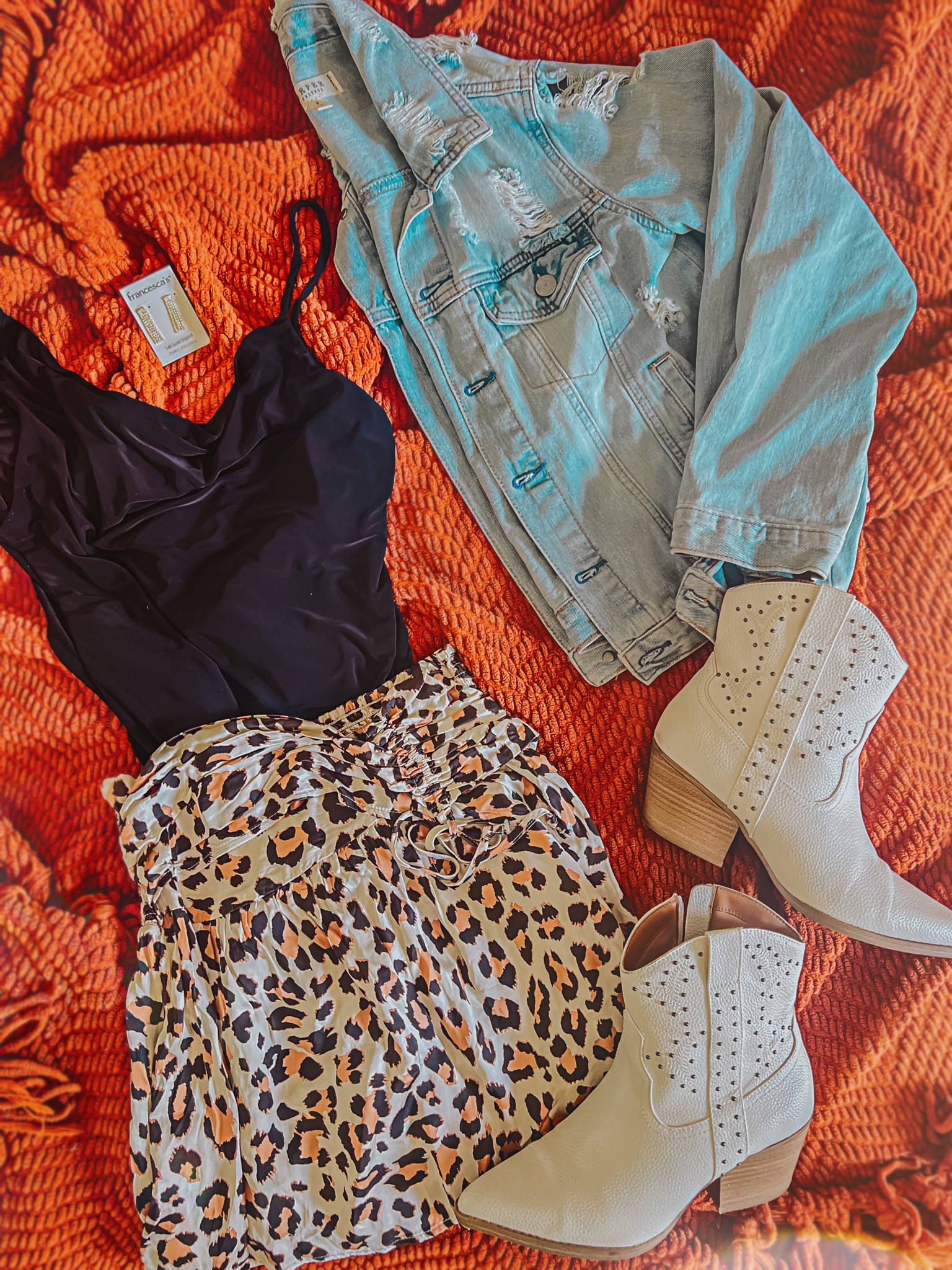Can't wait to wear this #fallfashion at the Ed Sheeran concert this weekend. Check out this adorable soft slinky leopard skirt from Aerie and these chic white ankle #fallboots from Target paired with my new favorite distressed jean jacket and black bodysuit. My absolute Fall go-to's right now!! 

#LTKSale #LTKsalealert #LTKSeasonal