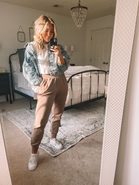 Cropped light wash denim jacket, white tee shirt, tan high waisted joggers, white sneakers, Spring look, casual outfit


#LTKunder100 #LTKSeasonal #LTKFind