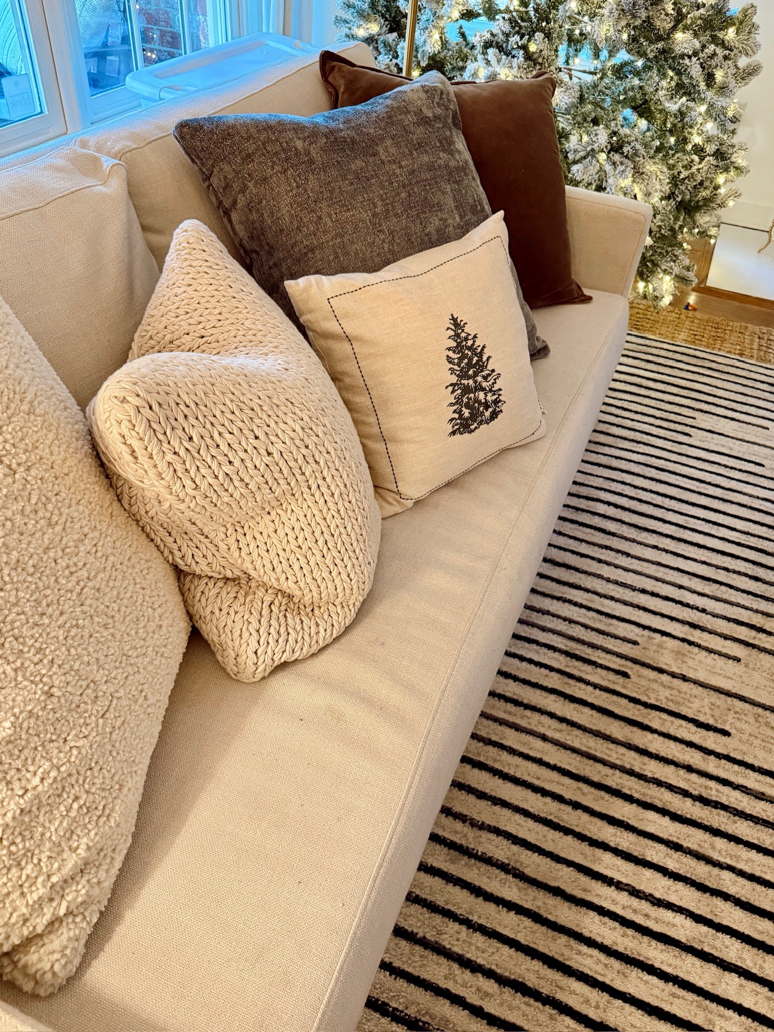 Christmas pillow combo in our living room!!

#LTKHome #LTKSeasonal #LTKHoliday