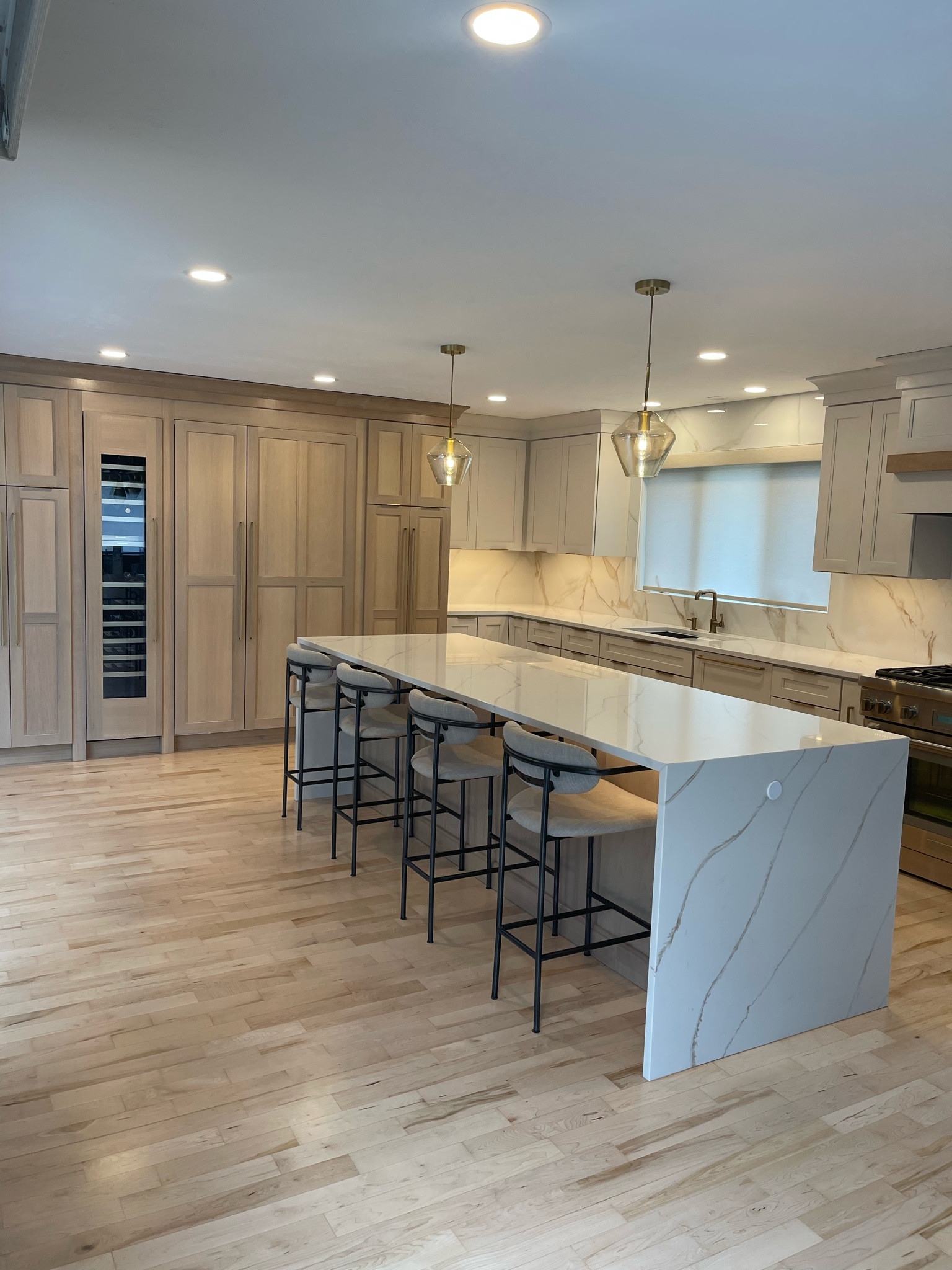 Our kitchen reno is complete! We chose a light white alabaster oak for our built in pantry/fridge/freezer, and a creamy off white for the rest of the upper & lower cabinets. Gold hardware, and the black on these barstools tie perfectly into the dining room. 

#LTKFind #LTKhome #LTKstyletip