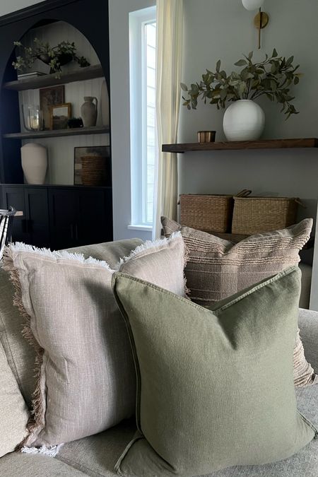Cushion trio ..sizes are 22” and 20” 
I’m slightly obsessed with the green linen cover! 
Modern organic home 

#LTKhome