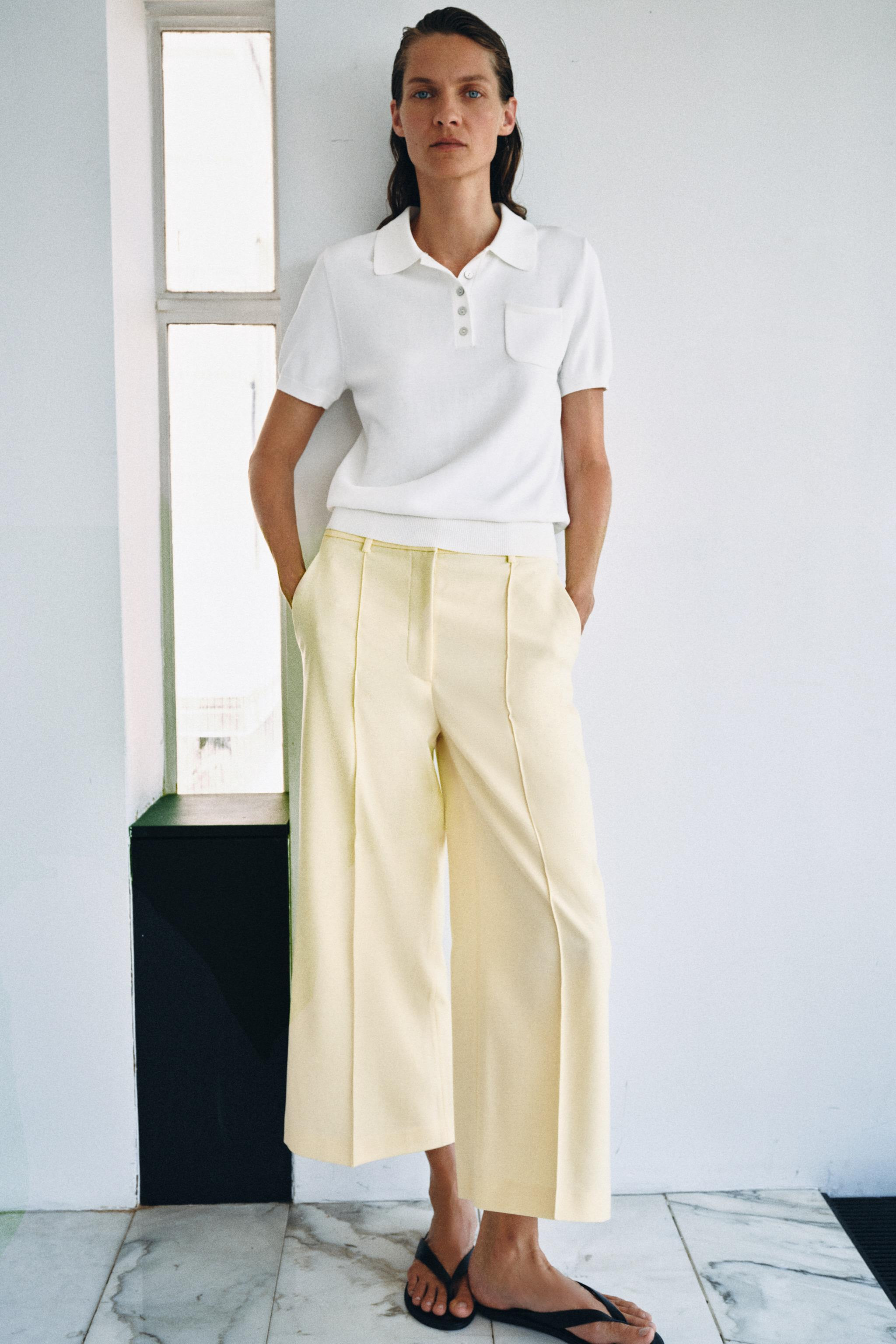 Polo neck top with short sleeves. Front patch pocket. Front buttons. Ribbed trim. | Zara US