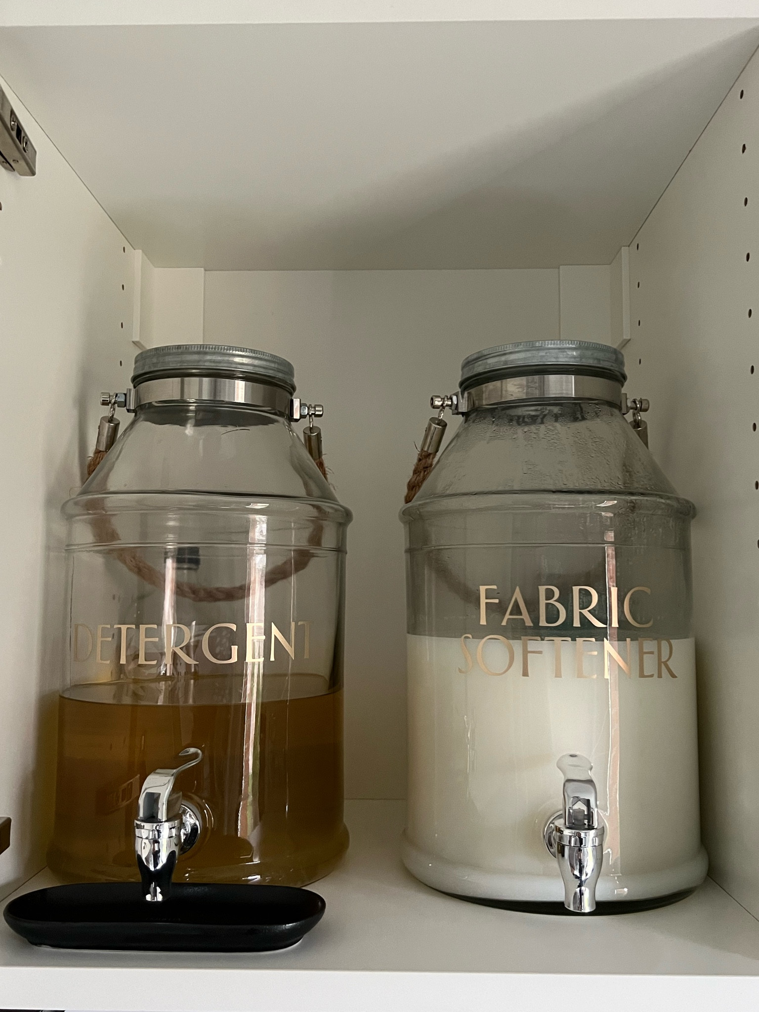 I use a drink dispenser for my laundry detergent and fabric softener. I’ve had them for a year and never had problems with clogging or dispensing yet  

#LTKFind #LTKhome