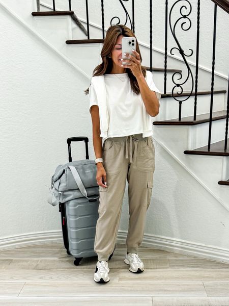 Cargo pants in small, color Khaki(lightweight, quick dry, roomy pockets, comfy).
White t-shirt in small tts.
White sweatshirt in small tts.
New Balance sneakers fit tts.
Gray weekender bag, and luggage are linked too.
Casual Outfit, travel outfit, airplane outfit, travel style, outdoor exploring, spring outfit, summer outfit, Amazon finds, sandals, white sneakers, fashion over 40, petite style.


#LTKtravel #LTKfindsunder50 #LTKstyletip
