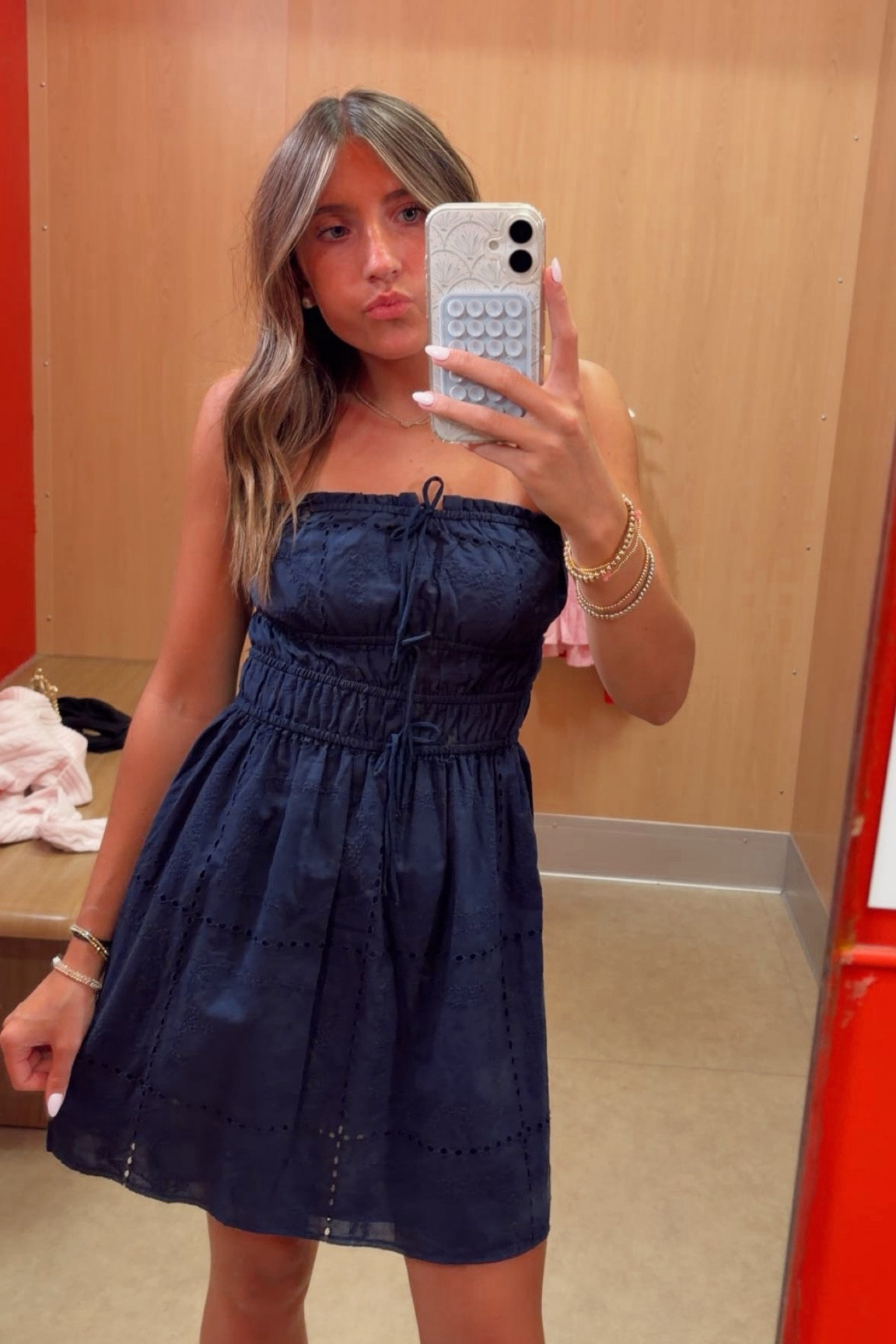 This simple but detailed navy dress from target is more than perfect. It is the mix of plain but hidden detail with an up close look. The strapless design and tie on the front pull the whole dress together. Throw on the dress and some sandals and you will be set for a simple summer look or the 4th of july

#LTKTarget #Targetfinds #outftinspo #Summerstyle #4thofjulyoutfit #ootd 

 #LTKdayinmylife #LTKootd #LTKSeasonal