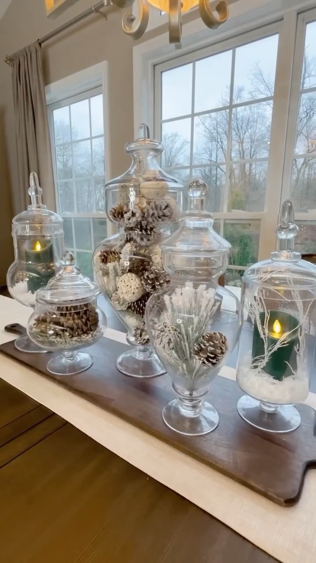 Winter apothecary jars ❄️ styled with evergreen candles, faux snow, flocked greens & pinecones. A classic, affordable way to create cozy winter vignettes anywhere in your home.

#LTKSeasonal #LTKHome