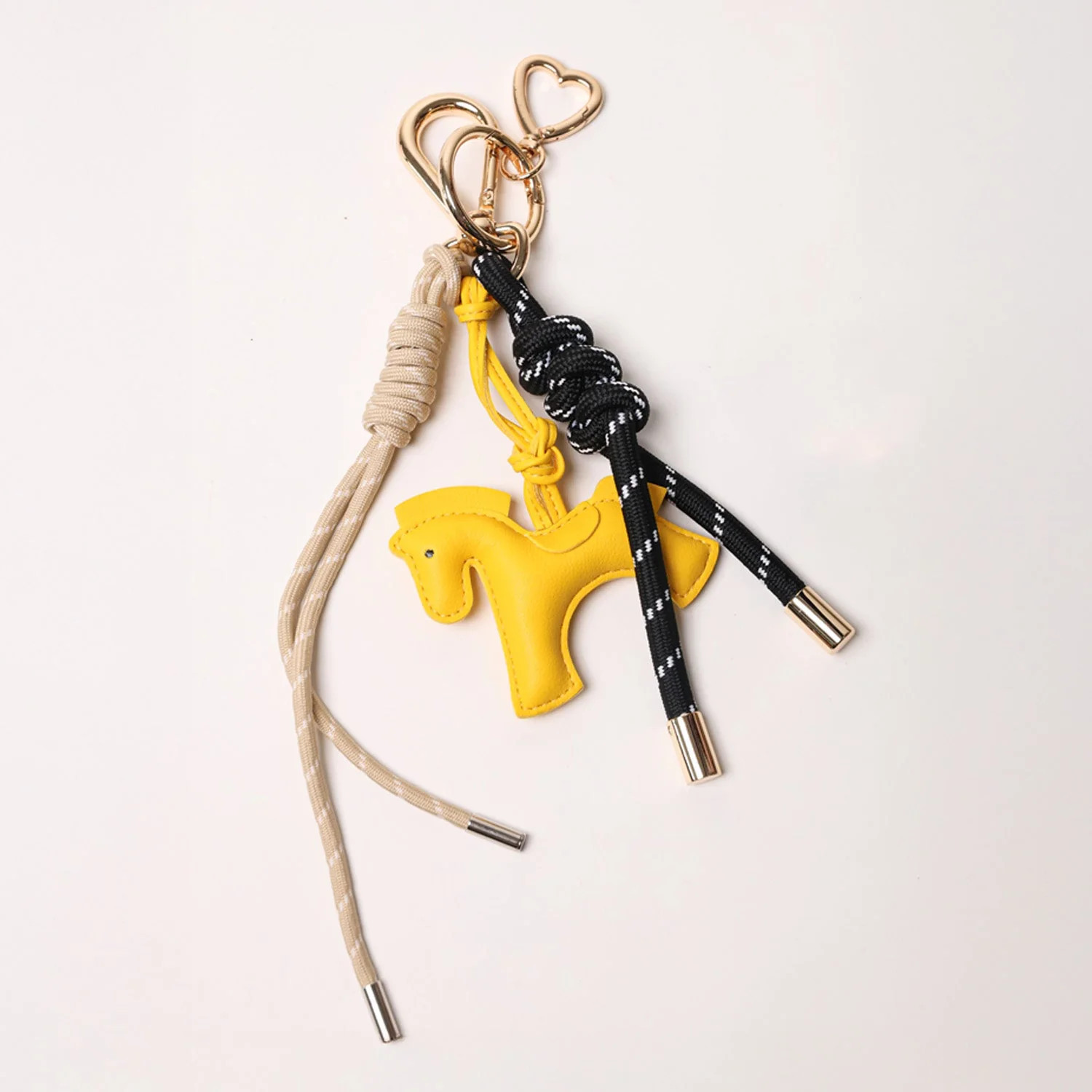 KEY CHAIN BLACK WITH CHARMS - TAN ROPE AND YELLOW HORSE | PopUps