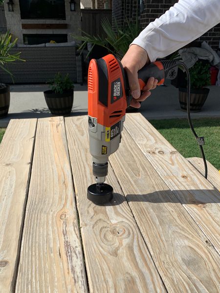 I wanted to add an umbrella to our picnic table. My hubby has a BLACK+DECKER 20V Max Drill with Home Tool Kit that was perfect for him to use to add my umbrella. This would make a great Father’s Day gift for the man in your life. #BlackandDecker #Tools #Drills #FathersDay #ToolKits #Tables #PatioTables 

#LTKhome #LTKunder100