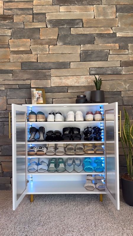 Show cabinet Amazon home decor must haves for a clean and organized closet! Holds 22 pairs of shoes and heels with led lights 