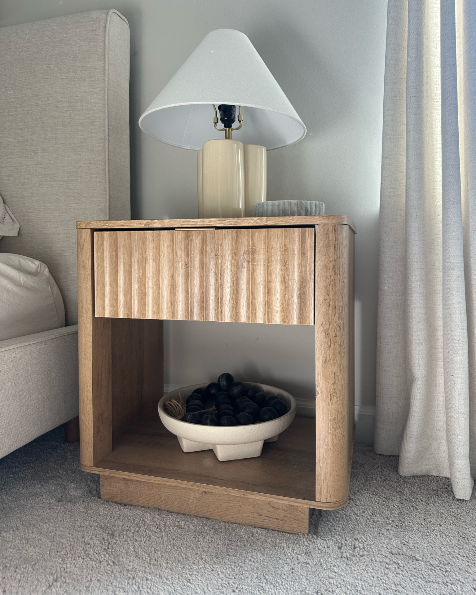 Nightstands
Fluted nightstand/ wood nightstand
Lamp 
Curtains 
Bed
Bowls 

#LTKsalealert #LTKhome #LTKfamily