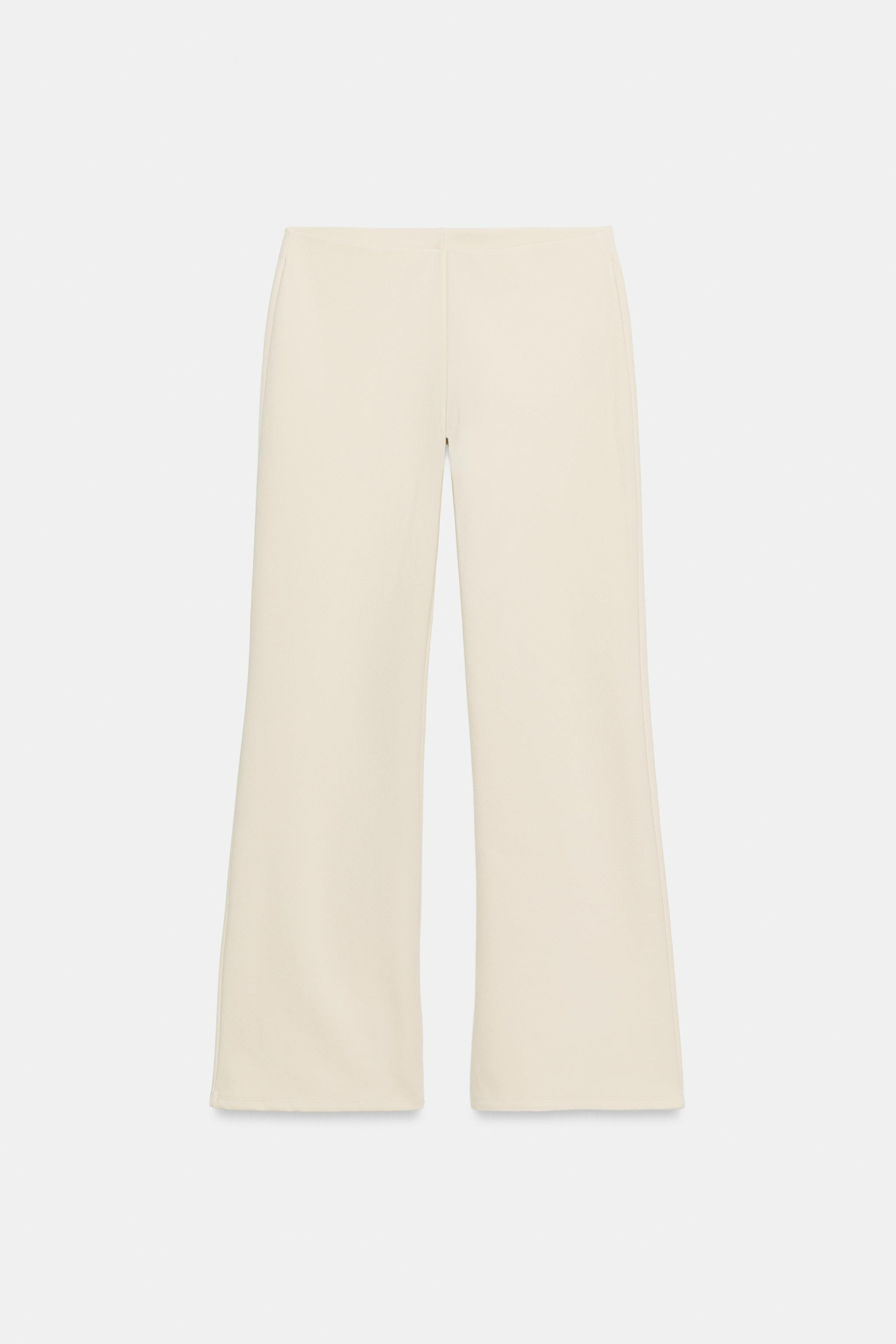 Model height: 178 cmTrousers made of a cotton blend. Mid-waist with an elastic waistband. Wide-le... | Zara UK