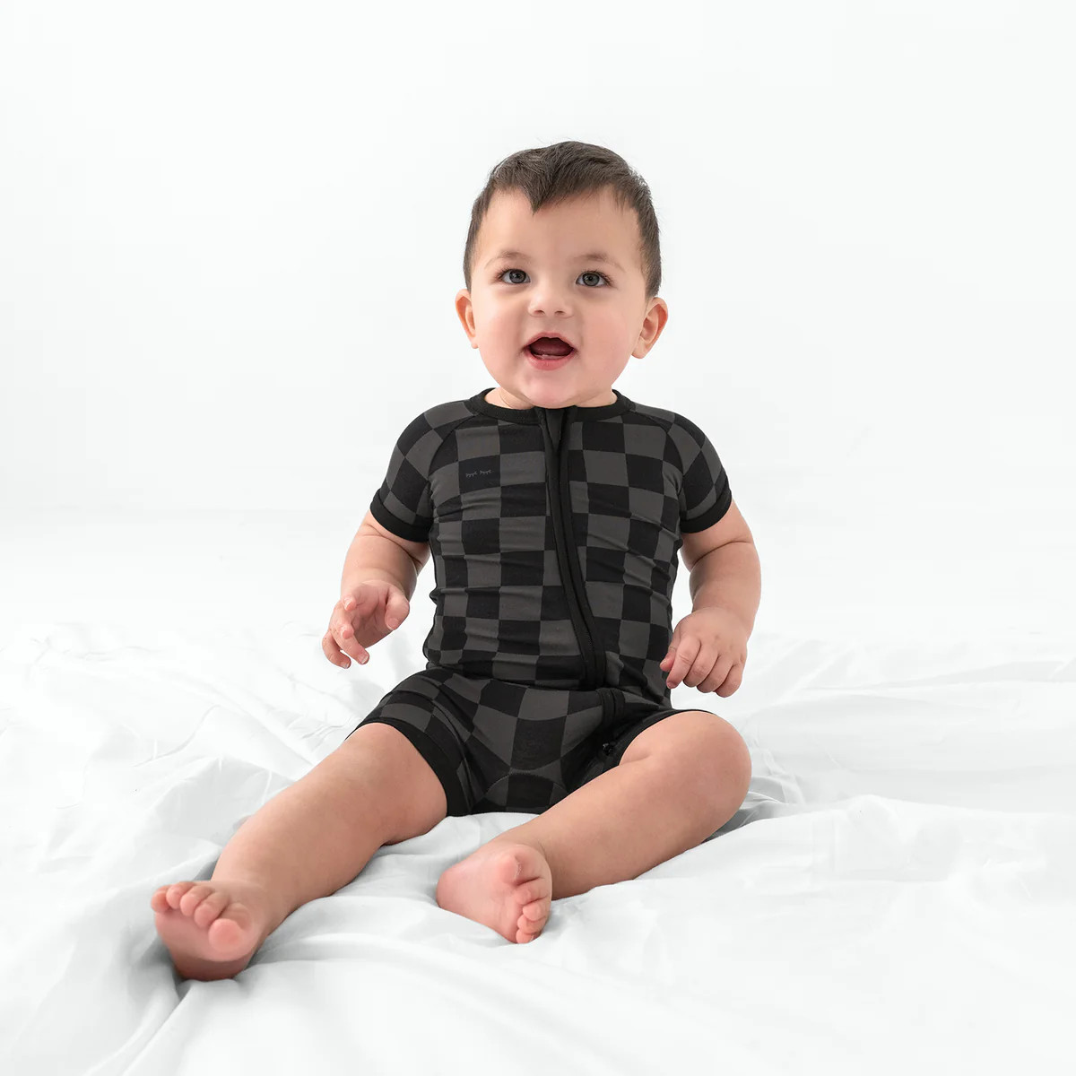 Monochrome Checks 
        Shorty Zippy | Little Sleepies
