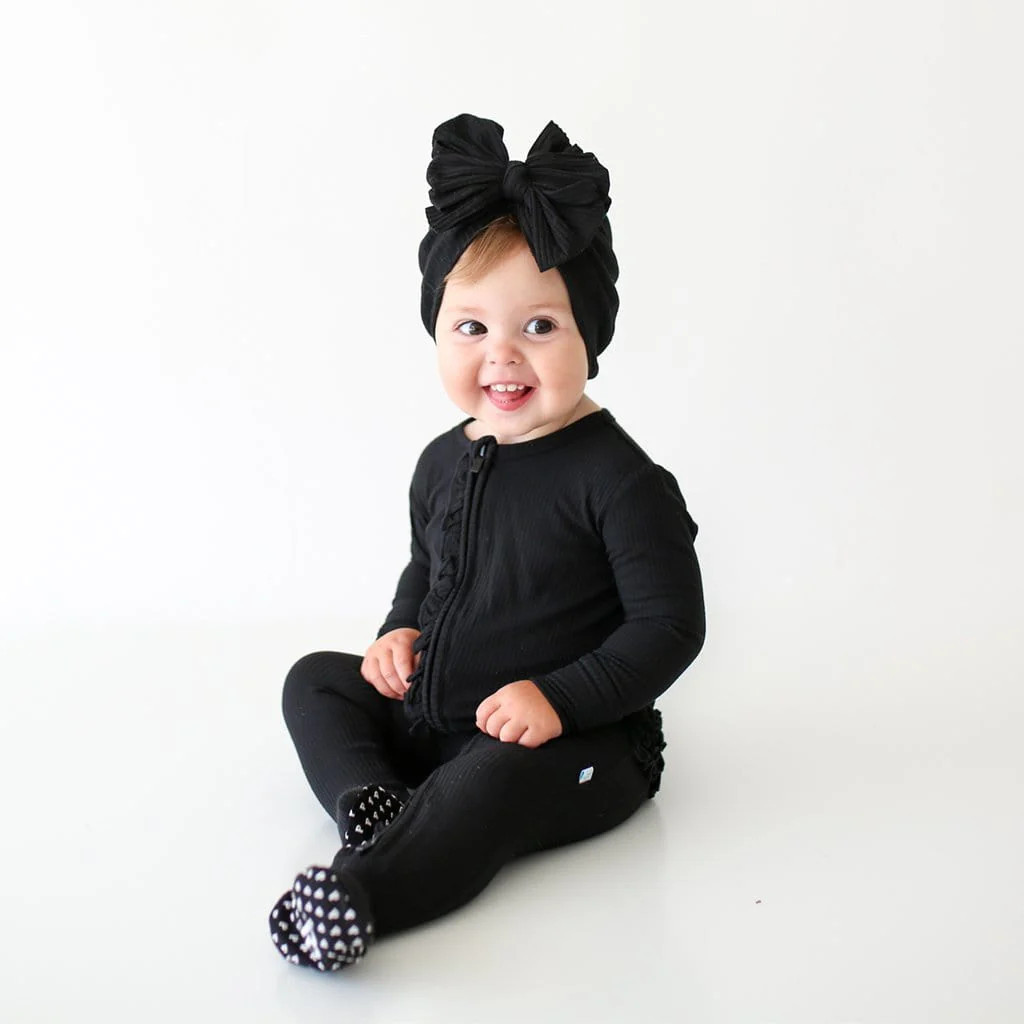 Black Ribbed Footie Ruffled Zippered One Piece | Posh Peanut