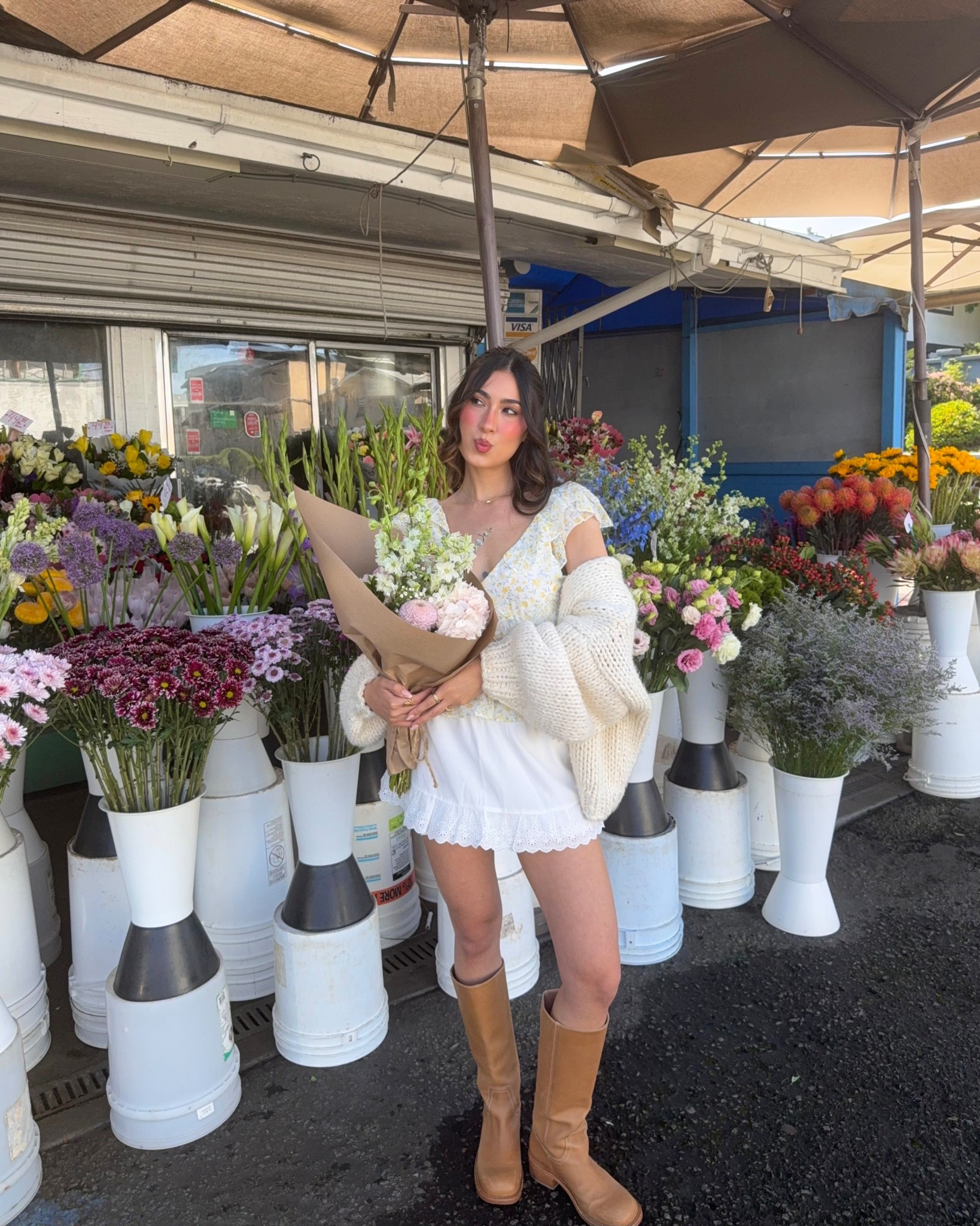 Flower market mornings outfit inspo : white frilly mini skirt, brown boots and frilly floral yellow top 🌼🌷💐

#LTKSeasonal #LTKSpringSale