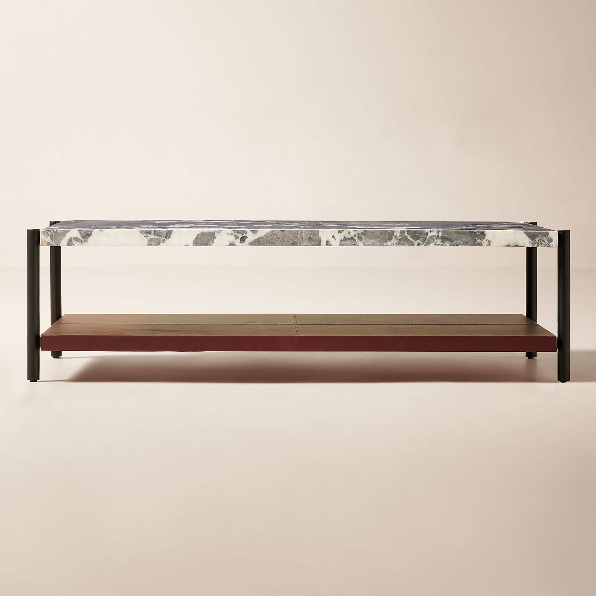 Verum 60" Rectangular Oxblood Leather Coffee Table With Grey Marble Top | CB2 | CB2